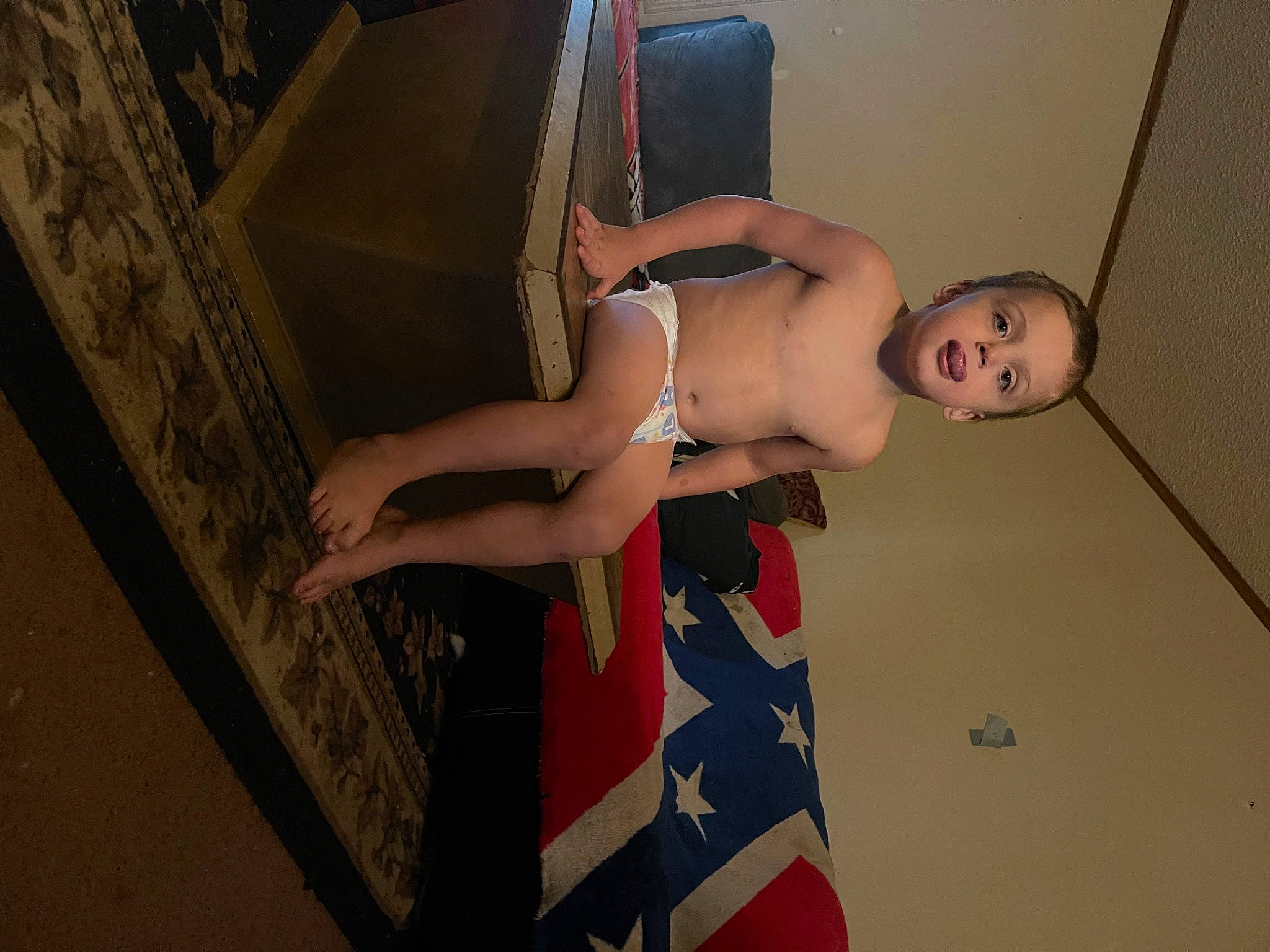 Kylo is registered to the contest to win money with this photo: abdomen, calf, chest, dress, elbow, finger, flash_photography, floor, foot, gesture, joint, knee, leg, person, shoulder, stomach, thigh, trunk, waist, wall