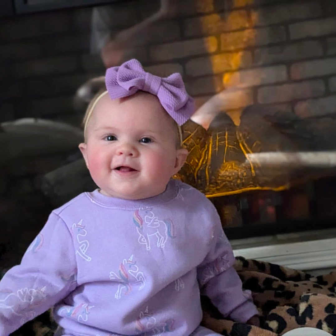 Kalayah joined the competition — help win amazing prizes! architecture, baby, babylaughing, clothing, costume, device, dress, face, fireplace, happy, hat, head, homedecor, indoors, laughing, person, photography, portrait, sitting, smile