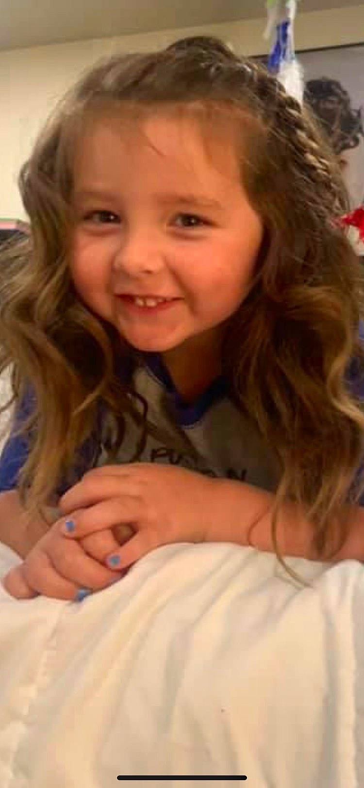 Madelynn is registered to the contest to win money with this photo: arm, cheek, chin, eye, eyebrow, face, facial_expression, hair, hairstyle, hand, head, human_body, joy, lip, mouth, neck, nose, organ, person, shoulder