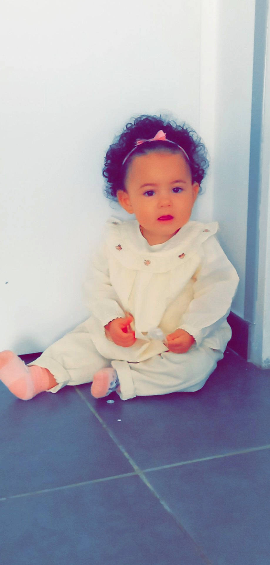 Kalissi participe au concours pour gagner de l'argent avec cette photo : baby, baby_toddler_clothing, cheek, child, chin, cool, dress, facial_expression, flash_photography, flooring, fun, hairstyle, happy, lip, outerwear, person, pink, skin, sleeve, standing