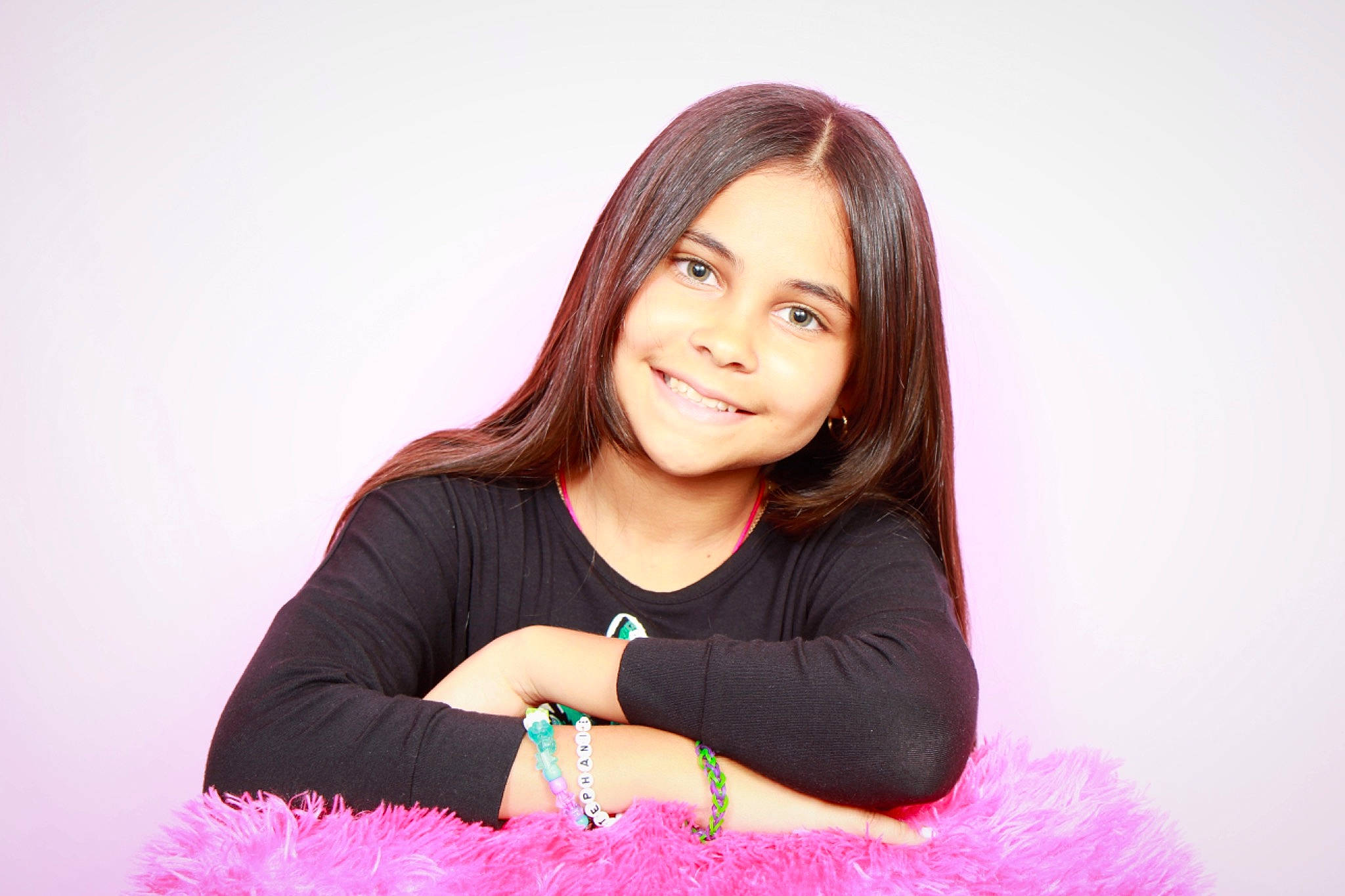 Stephanie is registered to the contest to win money with this photo: arm, black_hair, eyebrow, eyelash, finger, flash_photography, gesture, hair, hand, happy, head, joy, layered_hair, lip, magenta, person, petal, pink, purple, skin