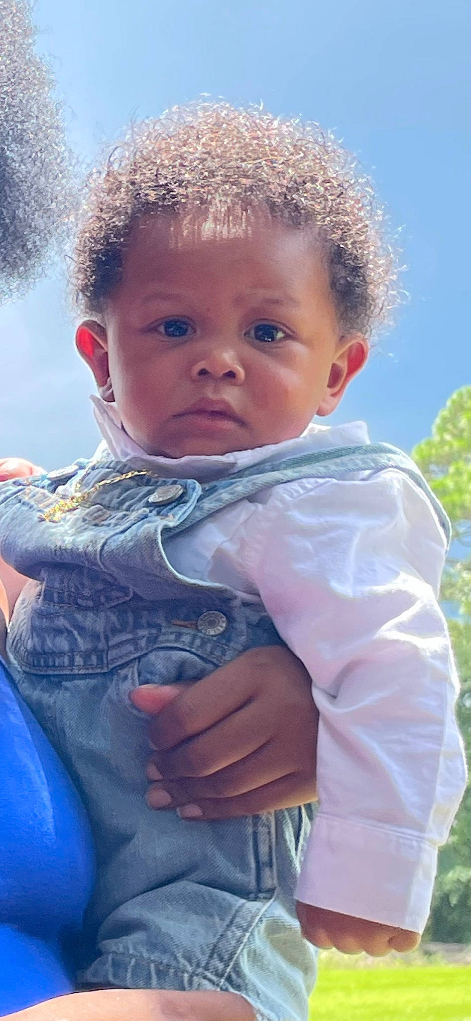 Kaison is registered to the contest to win money with this photo: baby, baby_toddler_clothing, child, fun, gesture, grass, happy, head, human_body, iris, leisure, nose, people_in_nature, person, plant, play, skin, sky, sleeve, toddler