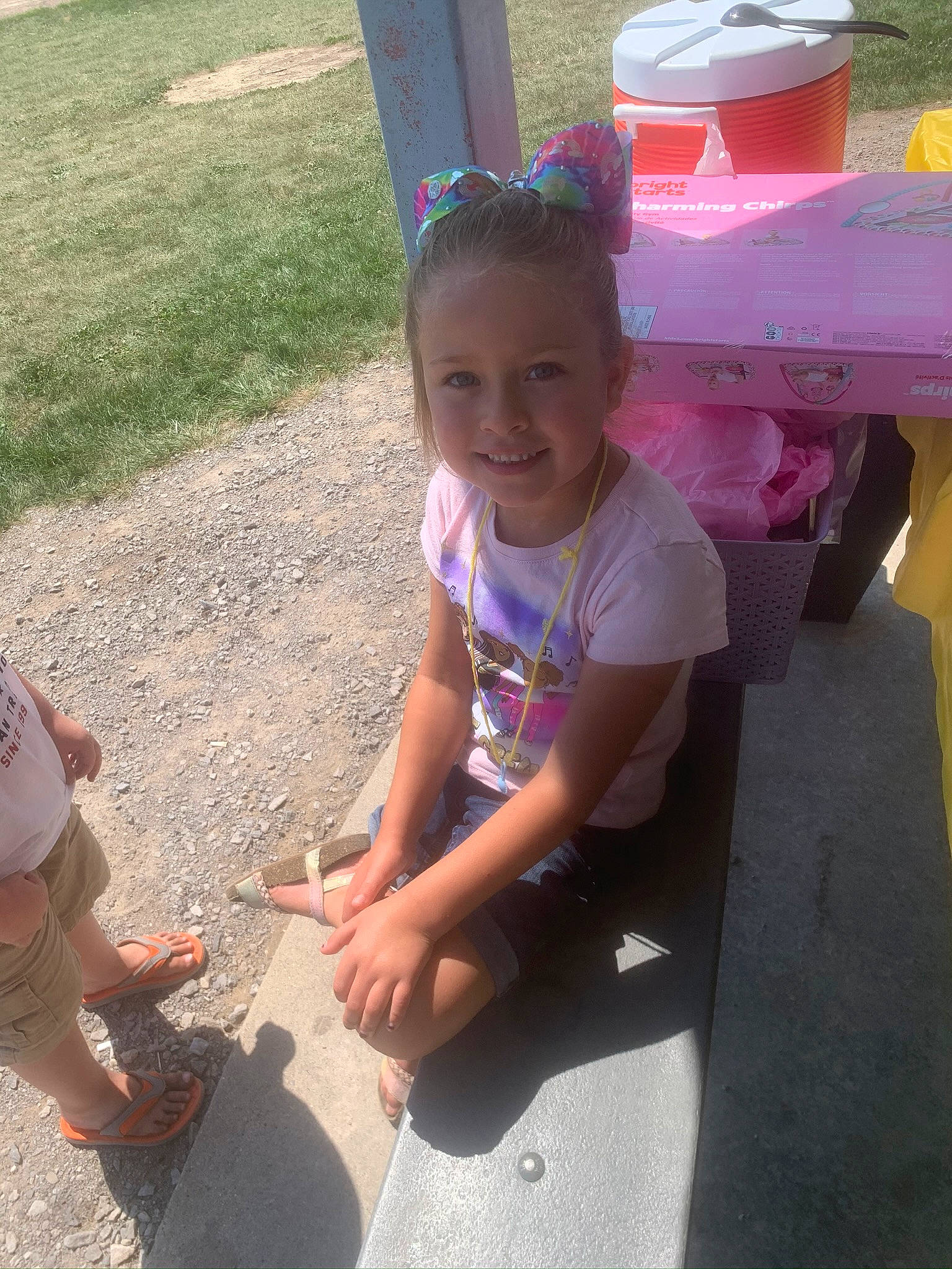 Yesenia is registered to the contest to win money with this photo: asphalt, child, event, fun, grass, happy, human_leg, joy, leg, leisure, magenta, morning, mouth, person, recreation, sandal, shorts, smile, sneakers, summer