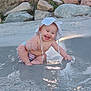 baby, child, smiling, hat, water, beach, rocks, trees, sunset, playing, diaper, nature, outdoor, happy, sitting, reflection, sunlight, sand, cute, fun