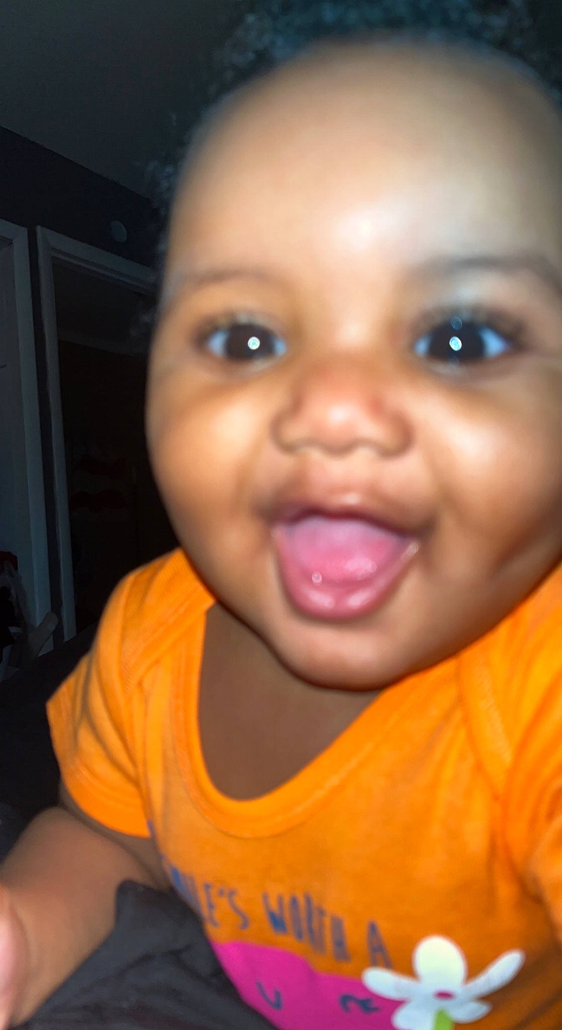 Jaliyah is registered to the contest to win money with this photo: cheek, chin, ear, eyebrow, eyelash, facial_expression, forehead, hairstyle, happy, iris, jaw, lip, mouth, neck, nose, orange, person, skin, smile, standing