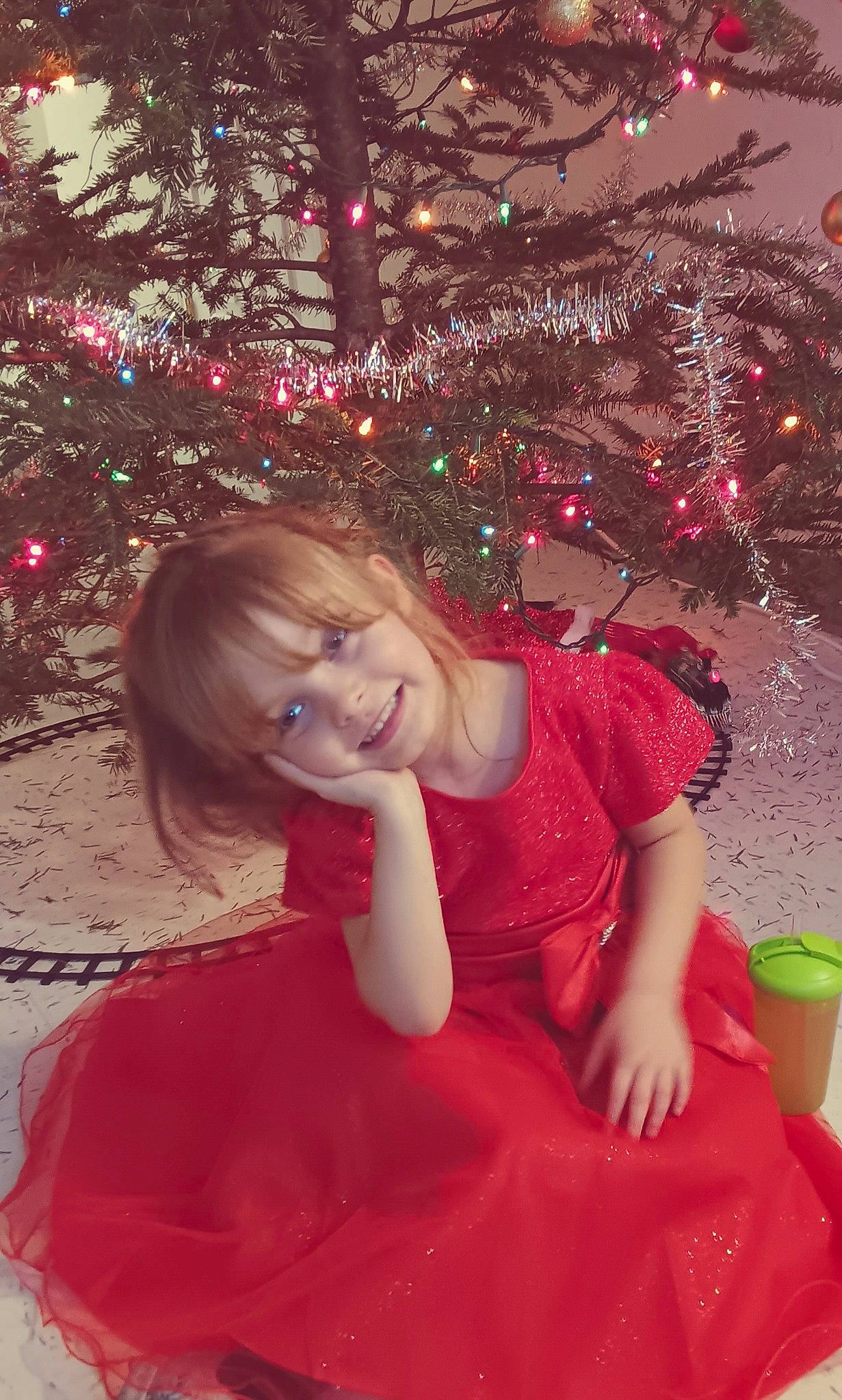 Lilliaunna joined the competition — help win amazing prizes! christmas_decoration, christmas_ornament, christmas_tree, dress, event, facial_expression, flash_photography, fun, happy, head, holiday_ornament, human_body, joy, ornament, person, pink, plant, red, smile, standing