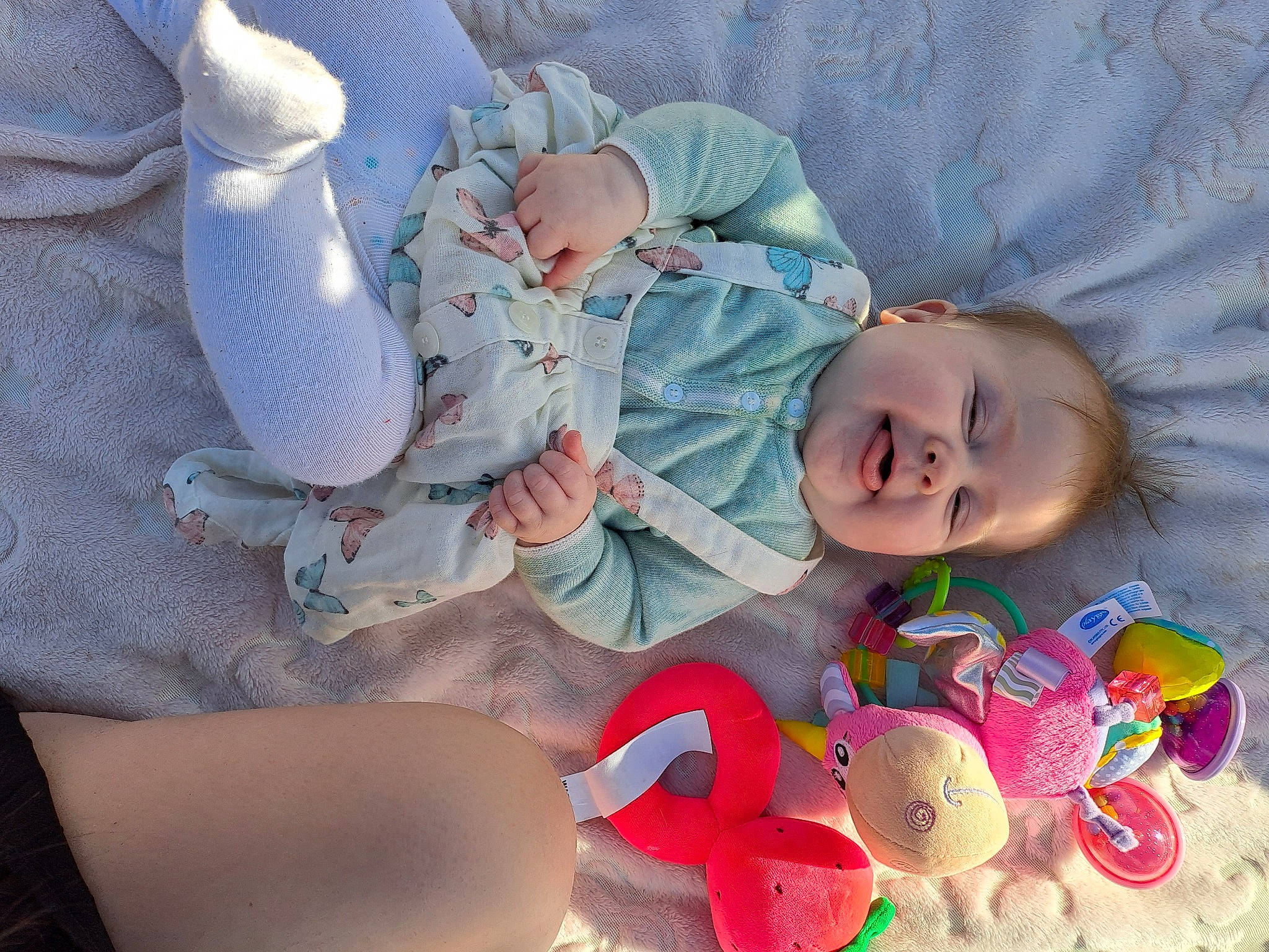 Aubrey joined the competition — help win amazing prizes! baby, baby_products, baby_sleeping, baby_toddler_clothing, carmine, cheek, child, comfort, eye, face, finger, happy, head, linens, pattern, person, skin, sleeve, smile, textile