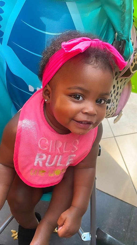 Iyonest is registered to the contest to win money with this photo: black_hair, cap, child, cool, fun, happy, headgear, leisure, lip, magenta, mouth, person, pink, recreation, sandal, shorts, skin, smile, t_shirt, thigh