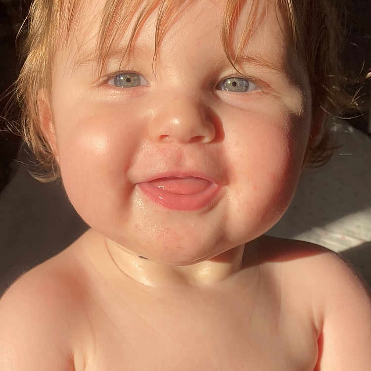 Ellanda joined the competition — help win amazing prizes! baby, blue_eyes, child, chubby, closeup, cute, expression, face, hair, happy, indoors, infant, natural_light, portrait, shoulders, skin, smile, sunlight, tongue, young
