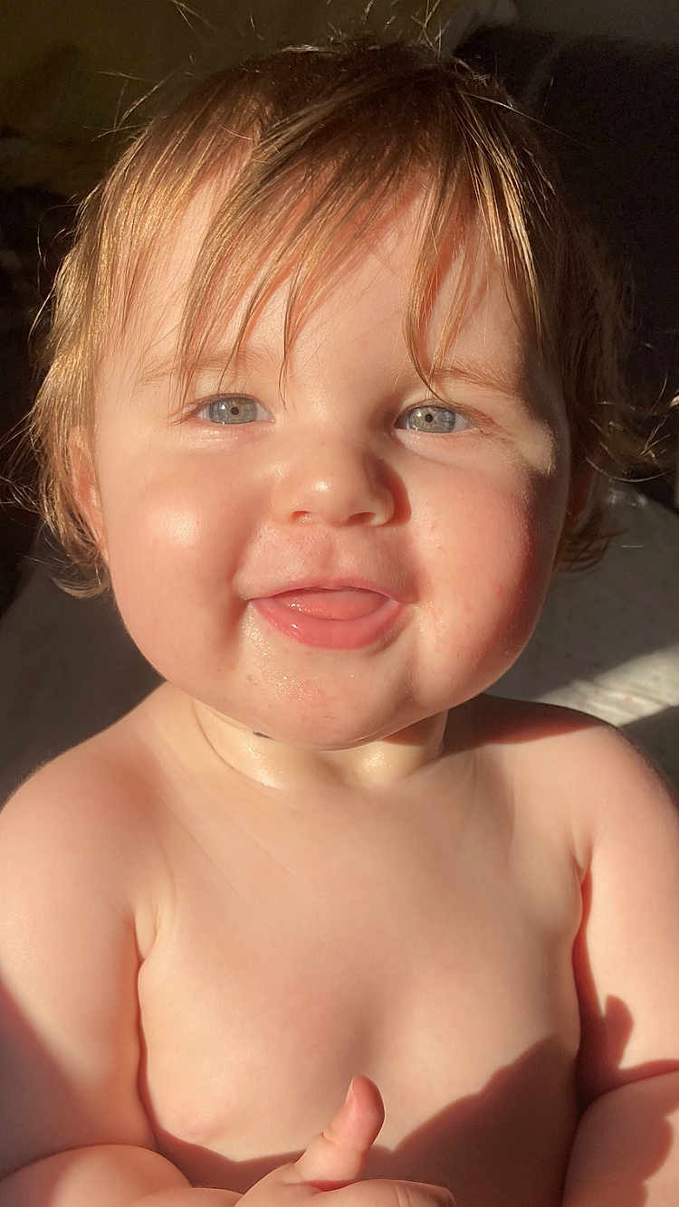 Ellanda joined the competition — help win amazing prizes! baby, child, smile, blue_eyes, hair, skin, indoors, sunlight, happy, closeup, face, expression, tongue, shoulders, infant, cute, natural_light, portrait, chubby, young