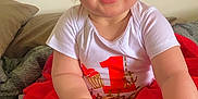 Ellanda joined the competition — help win amazing prizes! baby, child, smiling, tutu, headband, bow, shirt, sitting, bed, blanket, indoors, happy, cute, holding, bottle, foot, hand, face, person, one_year_old