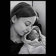 Khalifa a rejoint le concours — aidez-le/la à gagner de superbes lots ! black_and_white, baby, child, close_up, cozy, face, female, fleece, hooded_jacket, infant, love, mother_and_child, newborn, person, portrait, sleeping, tenderness, woman, young_adult, affection