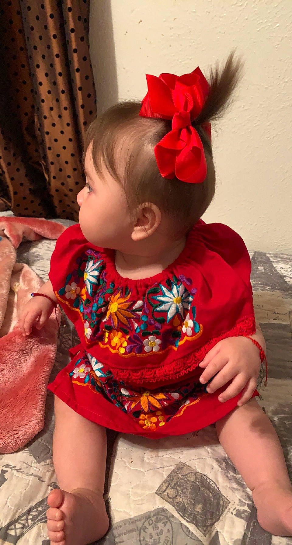 Kailani is registered to the contest to win money with this photo: baby, baby_toddler_clothing, cheek, child, chin, dress, facial_expression, fashion, happy, human_body, neck, organ, person, pink, red, skin, sleeve, standing, textile, thigh