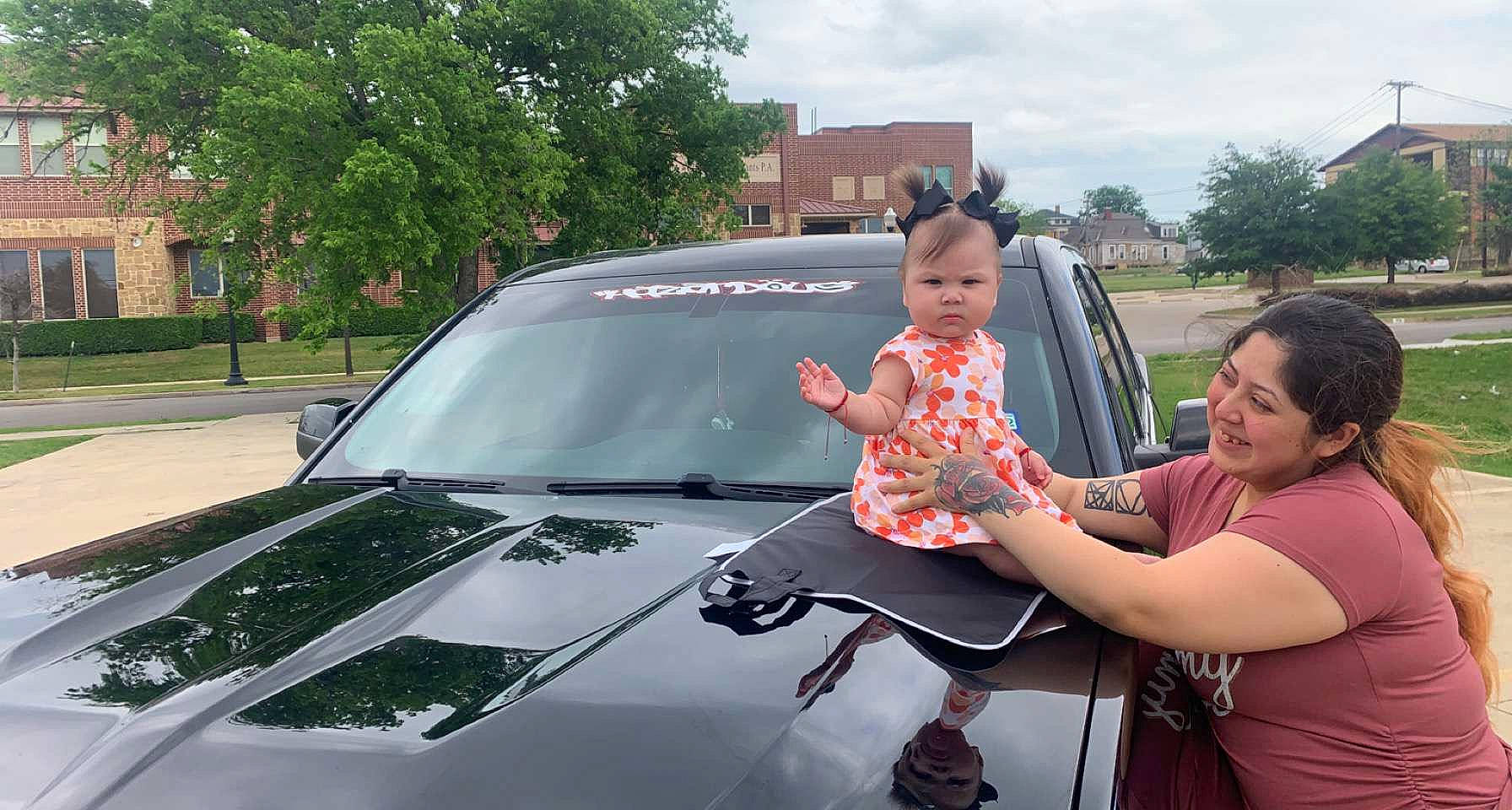 Kailani joined the competition — help win amazing prizes! auto_part, automotive_design, automotive_exterior, automotive_lighting, bumper, car, cloud, gesture, hood, joy, land_vehicle, motor_vehicle, parking, person, personal_luxury_car, plant, sky, tints_and_shades, tree, vehicle