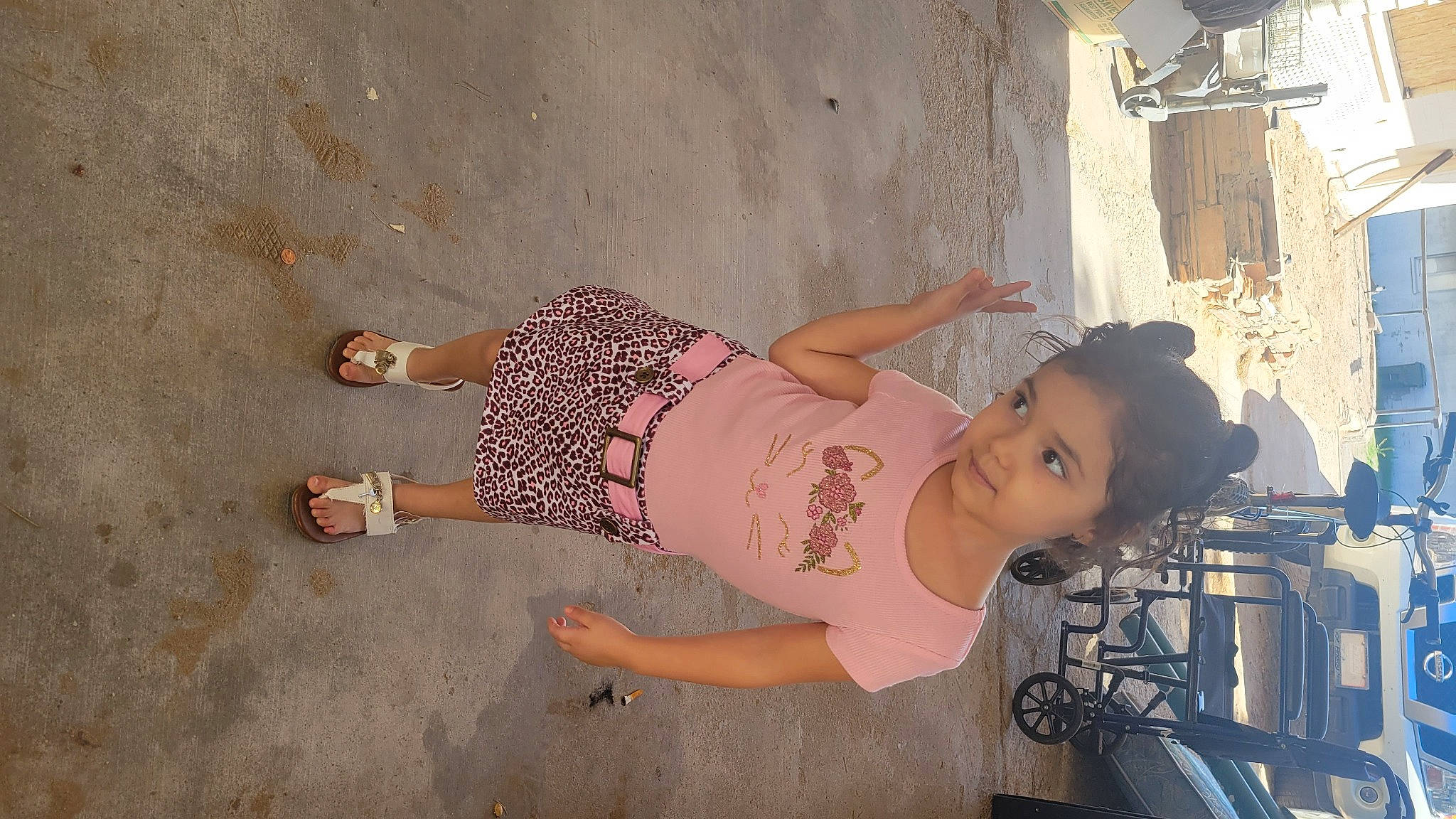 Angelina is registered to the contest to win money with this photo: barefoot, beauty, child, cool, foot, fun, happy, hat, human_leg, knee, leg, leisure, person, sandal, skin, smile, thigh, toddler, trunk, waist