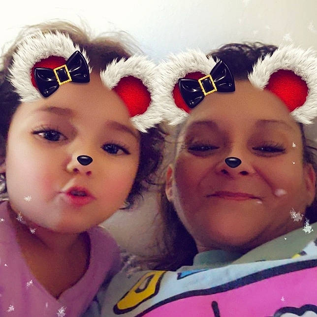 Angelina is registered to the contest to win money with this photo: baby_toddler_clothing, cap, cheek, child, costume_hat, ear, event, eye, eyebrow, eyelash, fun, gesture, happy, headgear, headwear, human_body, iris, joy, lip, nose