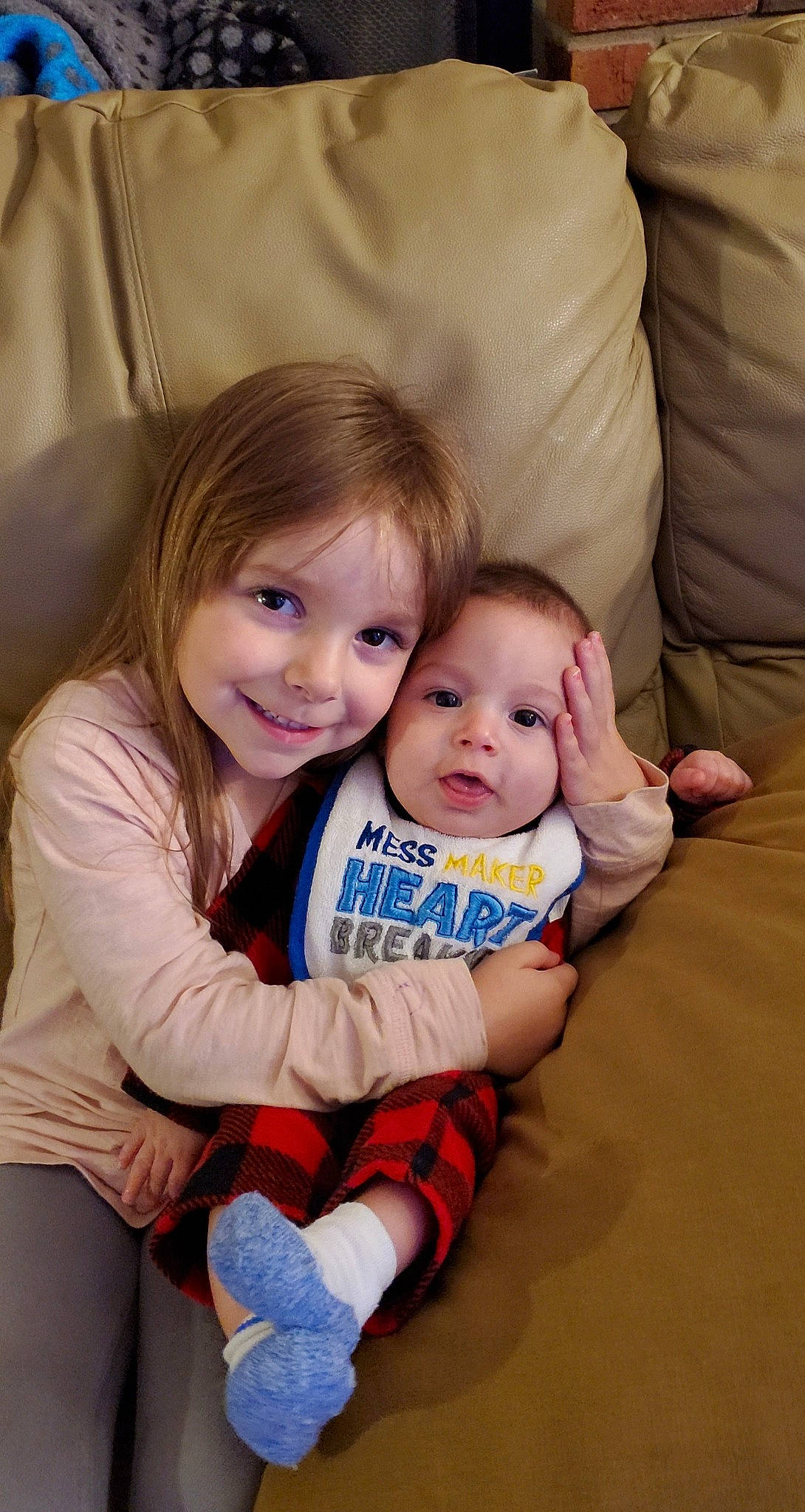 Hailie is registered to the contest to win money with this photo: arm, baby, baby_toddler_clothing, cheek, comfort, couch, eye, face, finger, flash_photography, flooring, fun, gesture, hair, happy, head, iris, joy, person, skin