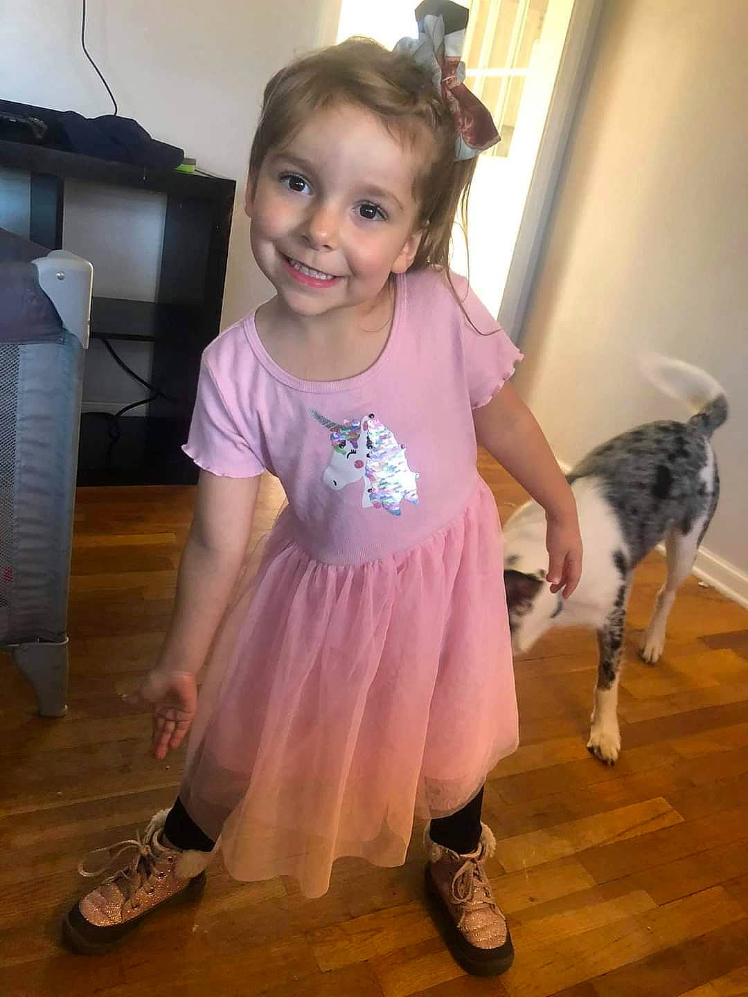 Hailie joined the competition — help win amazing prizes! baby_toddler_clothing, child, fashion_accessory, floor, flooring, footwear, happy, hardwood, home_appliance, joint, joy, magenta, pattern, person, pink, purple, sandal, shoe, sleeve, smile