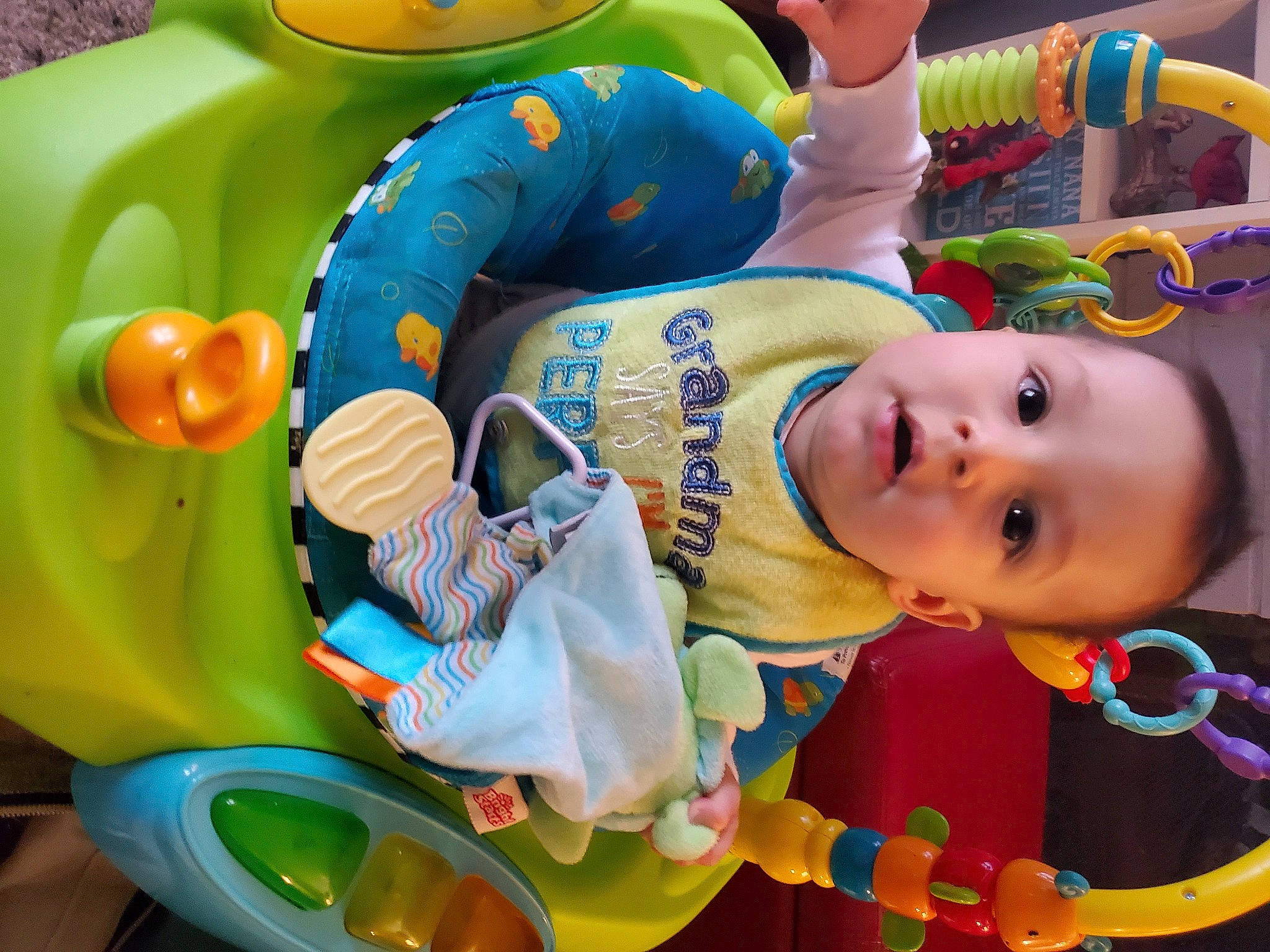 Xavier is registered to the contest to win money with this photo: baby, baby_products, baby_toddler_clothing, baby_toys, child, event, fun, green, happy, leisure, organ, person, photograph, product, recreation, room, smile, snapshot, toddler, toy