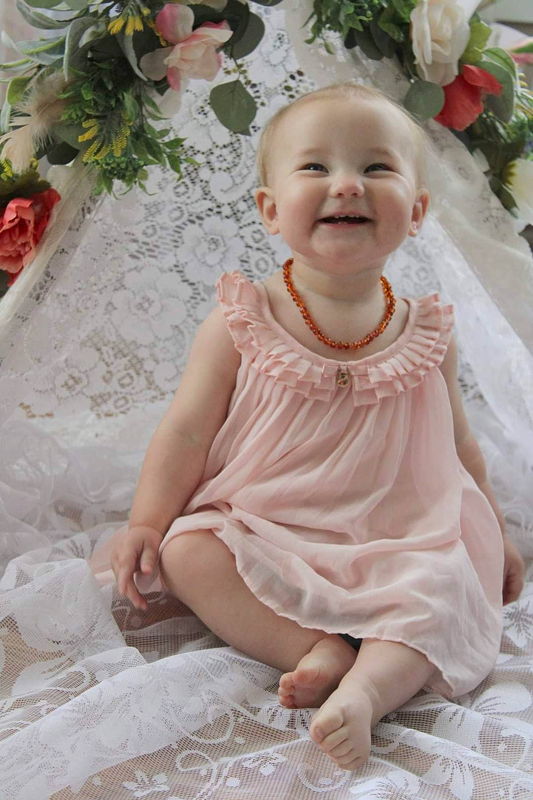 Liliya joined the competition — help win amazing prizes! baby, baby_toddler_clothing, bridal_accessory, dress, face, flooring, flower, flower_arranging, happy, head, joy, person, petal, photograph, pink, plant, skin, smile, textile, toddler