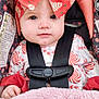 Ellerie is registered to the contest to win money with this photo: baby, child, car_seat, headband, red_bow, blanket, floral_pattern, safety_harness, pink, cute, infant, clothing, seatbelt, portrait, indoors, face, hand, soft_texture, patterned_fabric, close_up