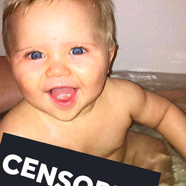 Jericho is registered to the contest to win money with this photo: baby, barechested, cheek, child, child_model, chin, face, facial_expression, forehead, head, joy, muscle, nose, person, photo_caption, photography, skin, smile, toddler