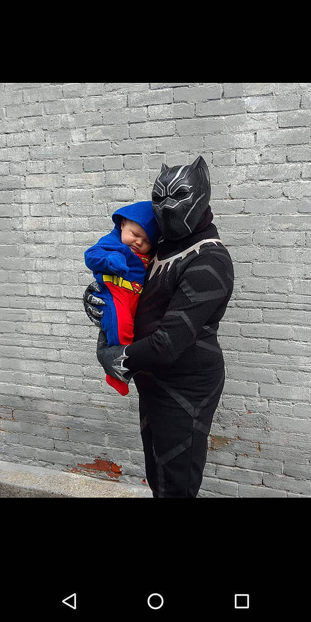 Jericho is registered to the contest to win money with this photo: blue, electric_blue, fictional_character, fun, jacket, outerwear, person, personal_protective_equipment, photography, recreation