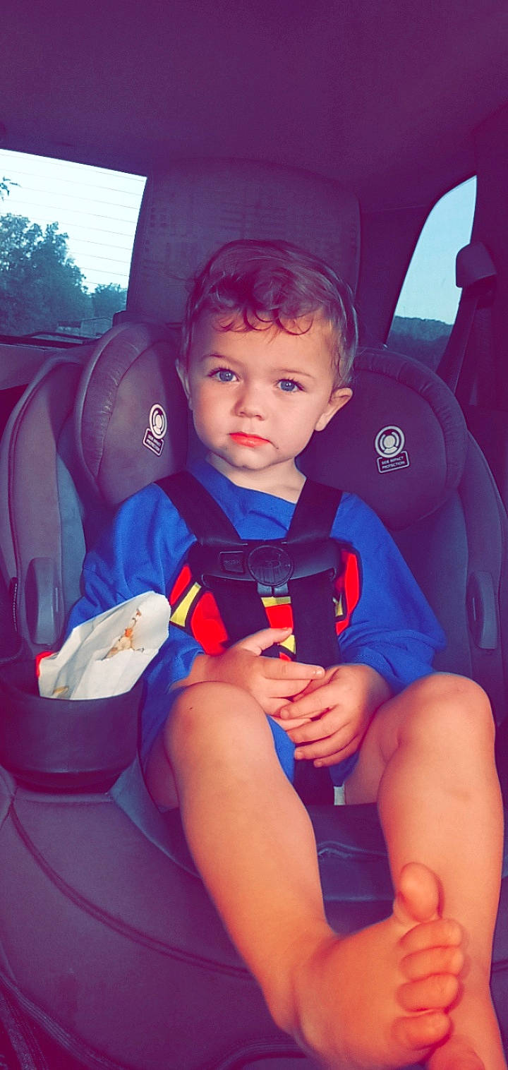 Kyson is registered to the contest to win money with this photo: azure, baby, baby_carriage, baby_toddler_clothing, car_seat, car_seat_cover, child, comfort, electric_blue, facial_expression, finger, fun, happy, mouth, person, seat_belt, skin, steering_wheel, thumb, toddler