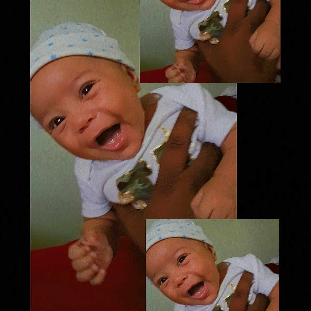 Orrian is registered to the contest to win money with this photo: baby, infant, child, smiling, laughing, portrait, collage, photograph, hat, white_clothing, onesie, adult_hand, held, indoor, close_up, happy, face, black_background, date_text, weekday_text