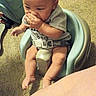 Orrian joined the competition — help win amazing prizes! baby, barefoot, belt, candid, carpet, child, curious, face, family, feeding_seat, furniture, gray_shirt, hair, hands, highchair, home, indoor, infant, portrait, sitting