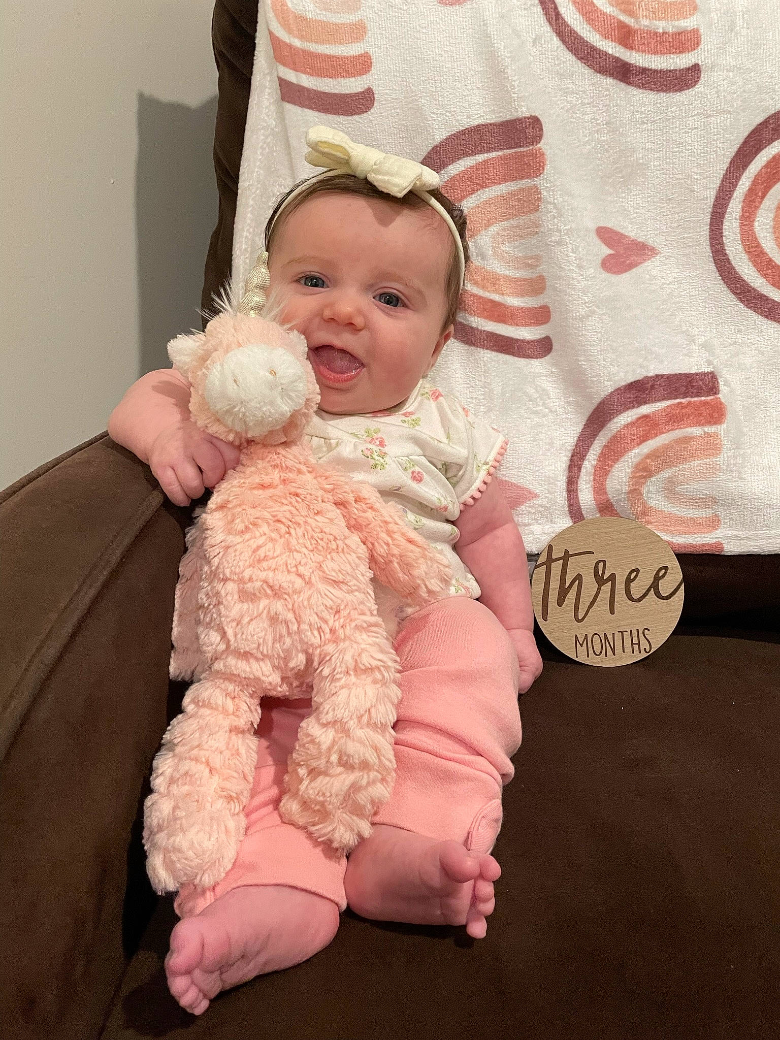 Maggie is registered to the contest to win money with this photo: baby, baby_toddler_clothing, cheek, child, comfort, event, fur, gesture, happy, pattern, person, pink, product, sitting, skin, sleeve, smile, stuffed_toy, teddy_bear, textile