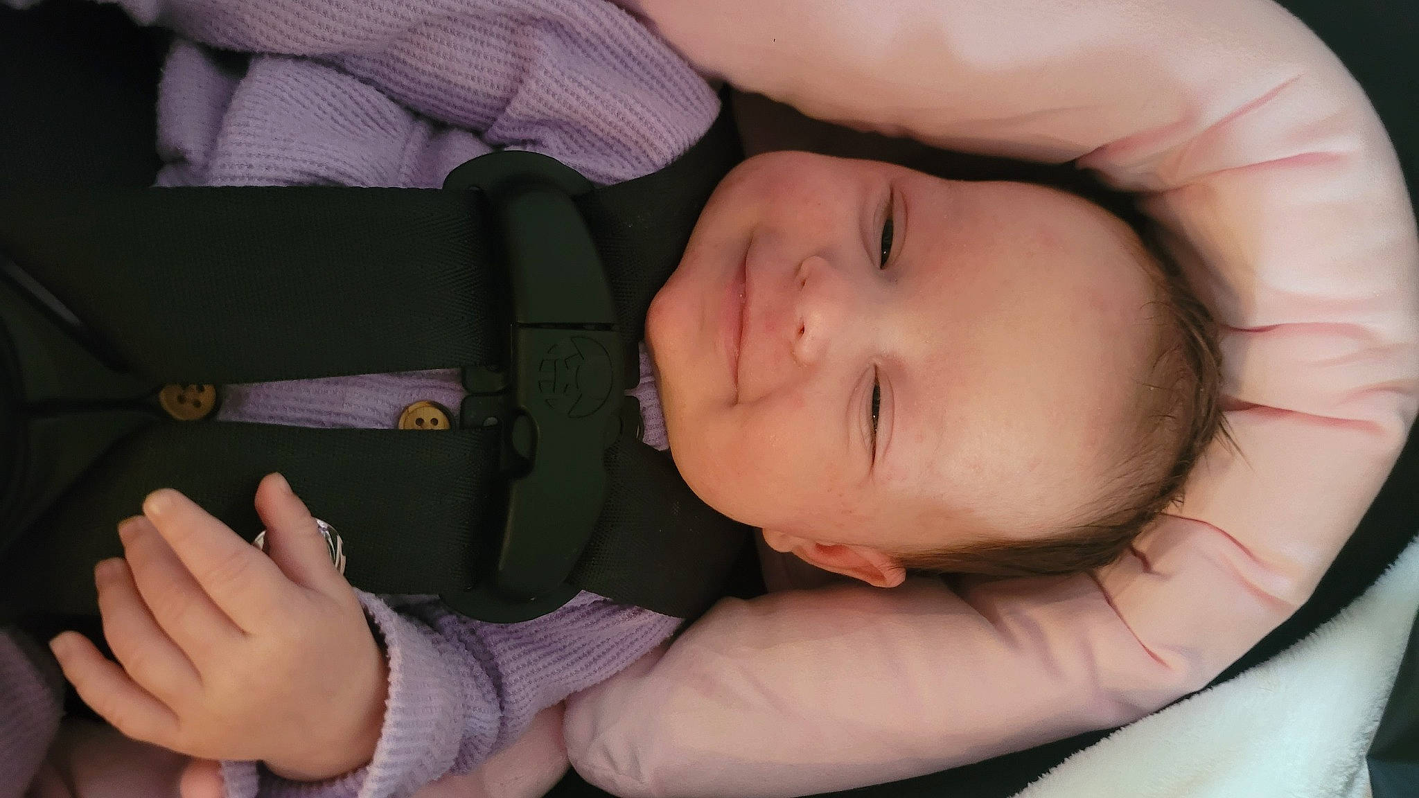 Arizona is registered to the contest to win money with this photo: arm, baby, baby_toddler_clothing, cheek, comfort, eye, eyebrow, eyelash, face, facial_expression, finger, gesture, hand, head, joy, lip, mouth, nose, person, product