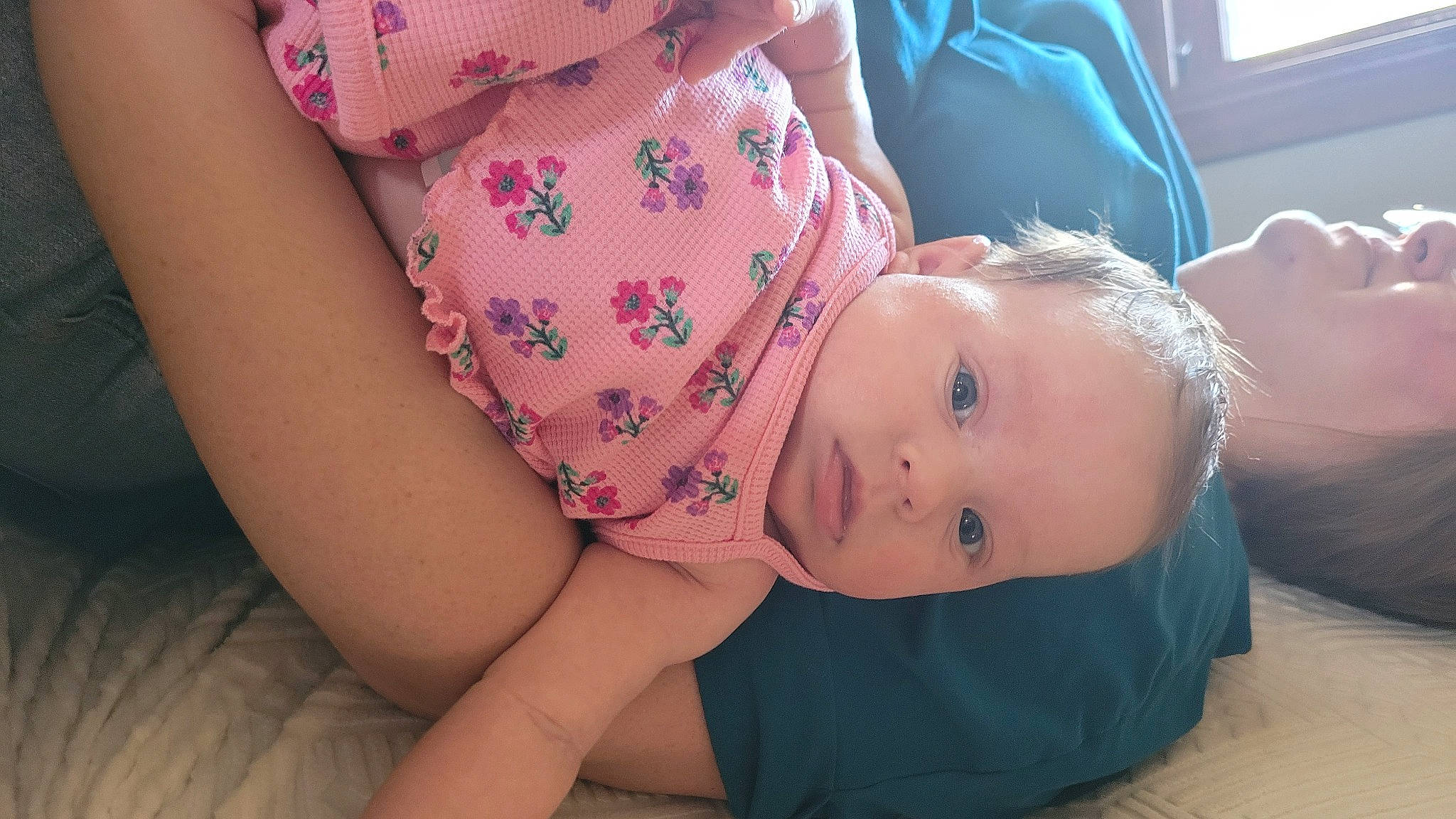 Arizona is registered to the contest to win money with this photo: arm, baby, baby_toddler_clothing, child, comfort, dress, elbow, eyelash, finger, hand, hat, joint, lip, mouth, neck, nose, person, shoulder, skin, thigh