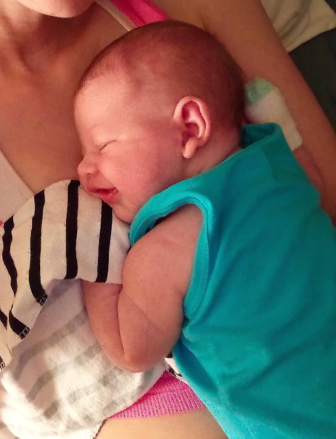 Oakland joined the competition — help win amazing prizes! baby, baby_sleeping, baby_toddler_clothing, cheek, comfort, eye, finger, gesture, hand, happy, human_body, mouth, neck, person, pink, shoulder, skin, sleeve, textile, thumb
