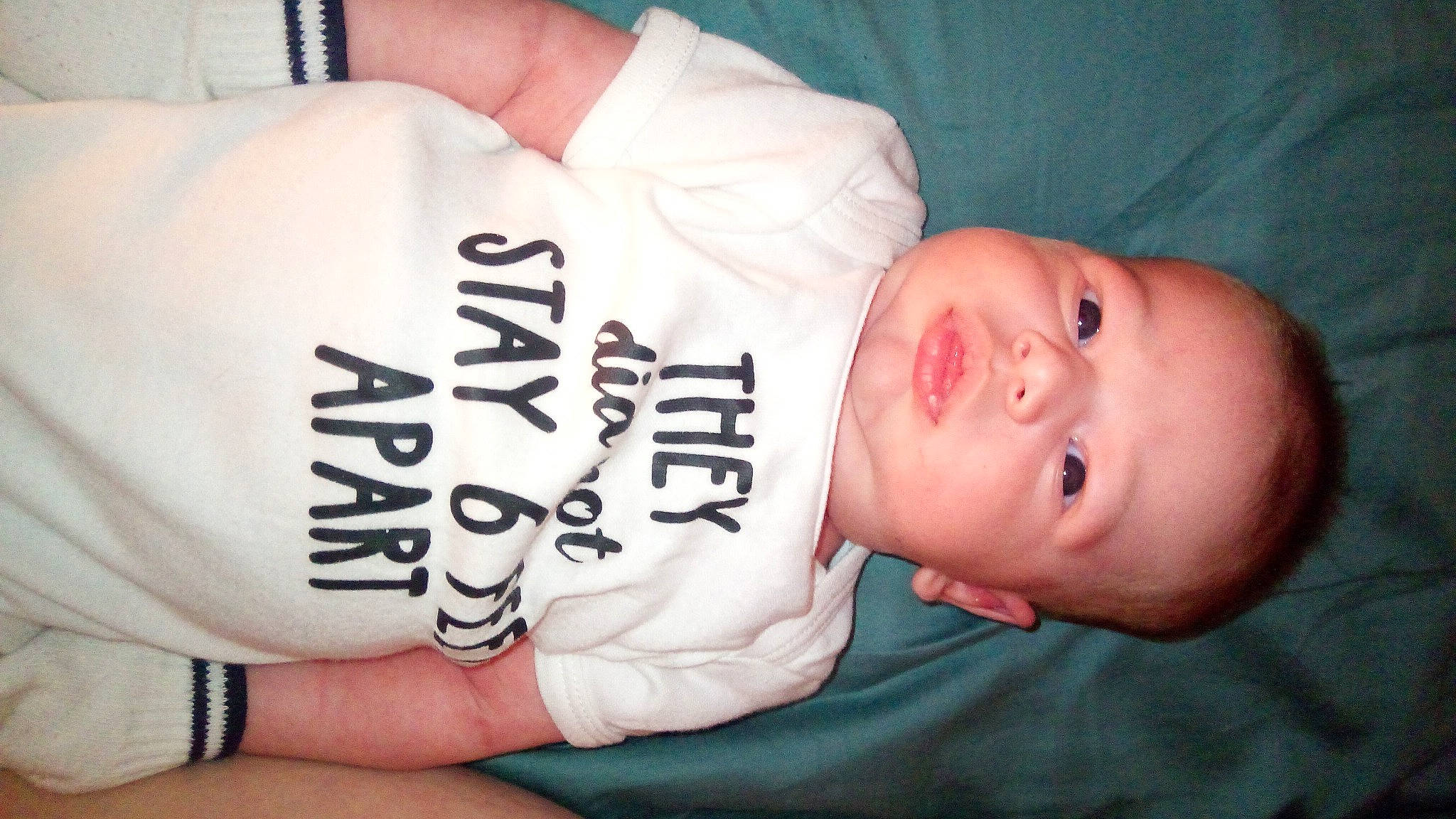 Oakland joined the competition — help win amazing prizes! baby, baby_toddler_clothing, chest, child, comfort, elbow, finger, font, hand, head, human_body, mammal, person, plant, product, skin, sleeve, smile, thumb, toddler