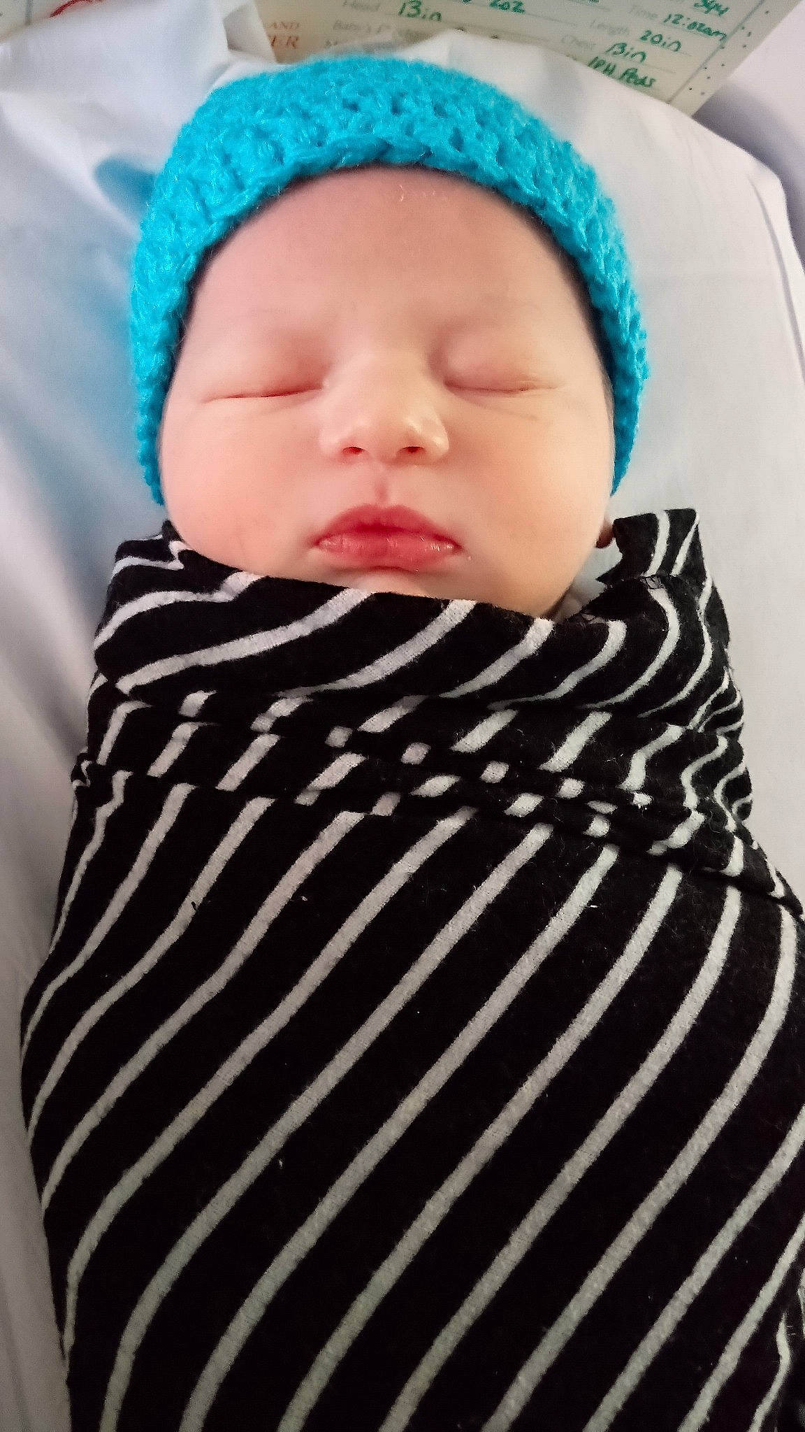 Oakland joined the competition — help win amazing prizes! baby, baby_sleeping, baby_toddler_clothing, cap, cheek, child, chin, comfort, eye, eyebrow, eyelash, headwear, iris, knit_cap, lip, pattern, person, skin, sleeve, textile