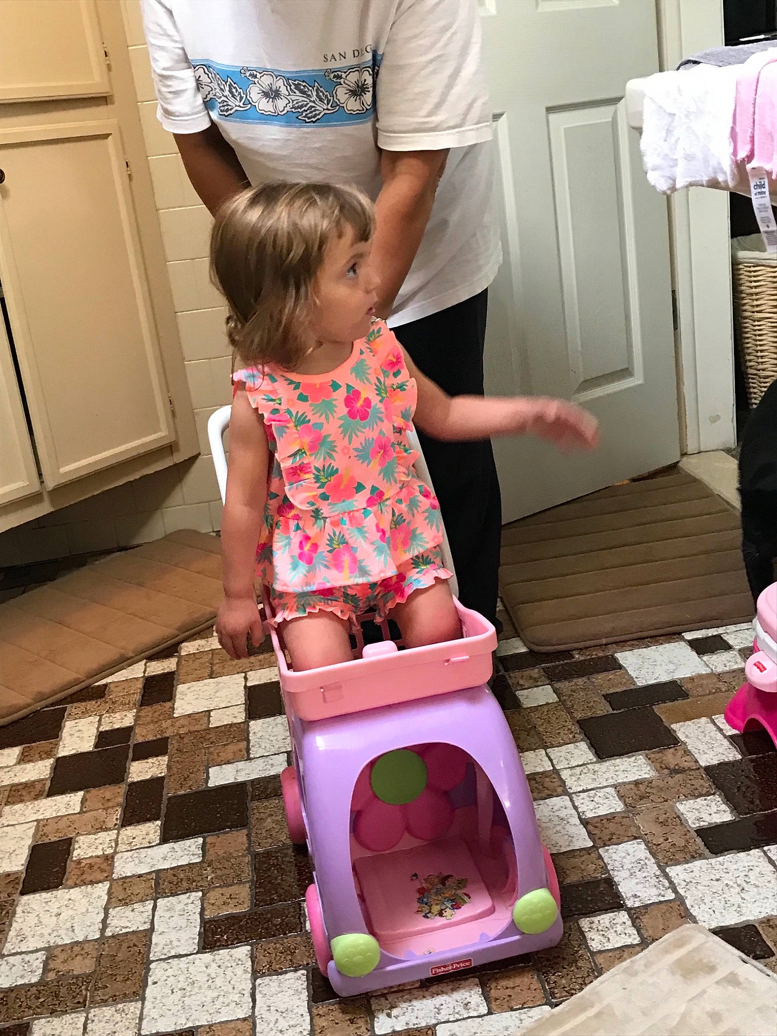 Briana is registered to the contest to win money with this photo: baby, chamber_pot, child, leg, person, pink, play, plumbing_fixture, potty_training, product, toddler, toilet