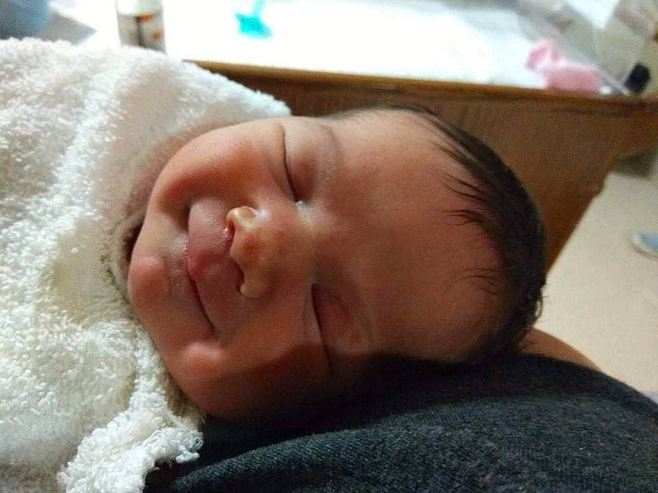 Mckinley is registered to the contest to win money with this photo: baby, baby_toddler_clothing, bedtime, cheek, child, chin, comfort, eyebrow, facial_expression, forehead, linens, lip, nap, person, skin, sleep, sweater, textile, toddler, wool