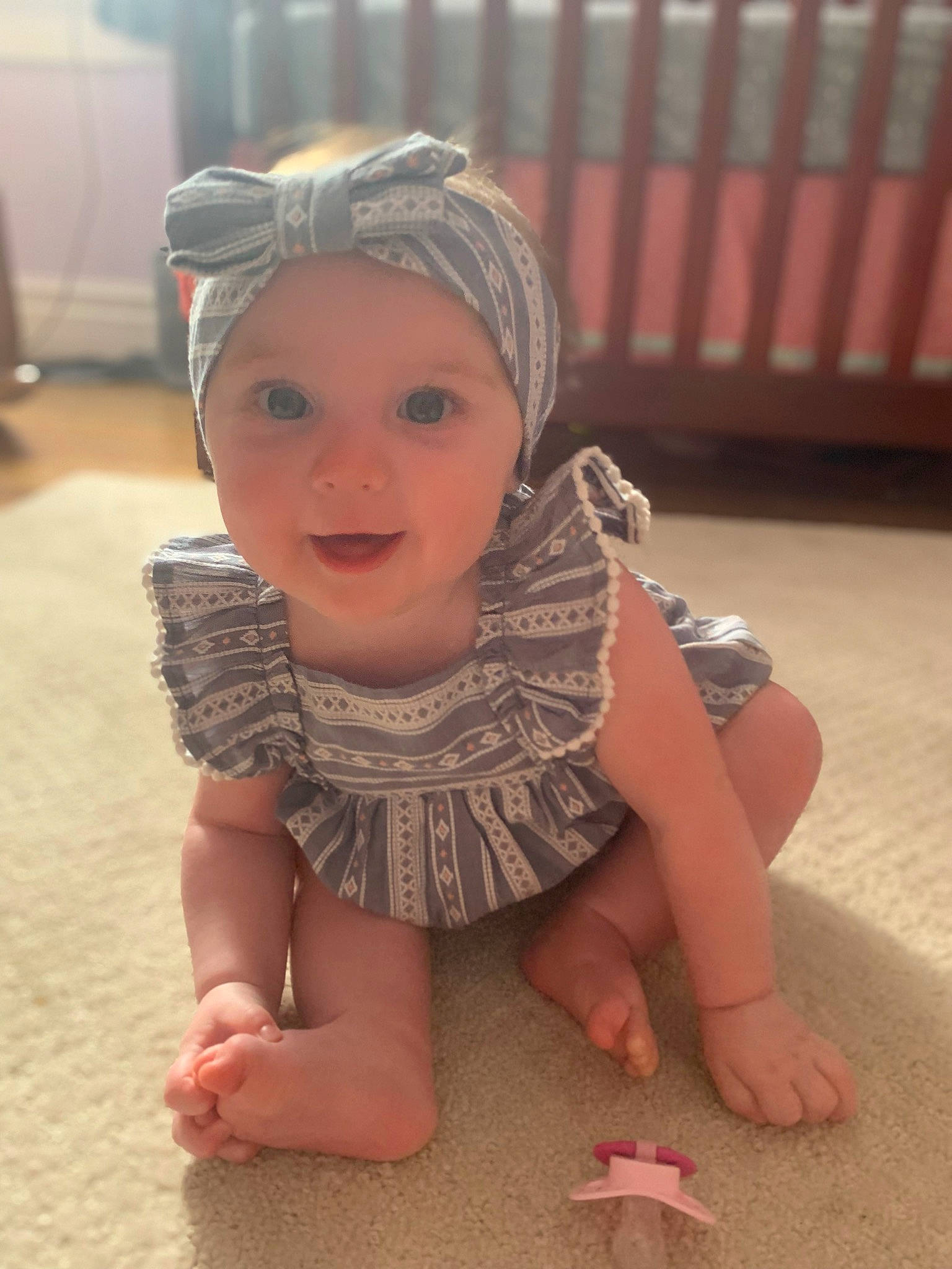 Fiona joined the competition — help win amazing prizes! baby, baby_toddler_clothing, cap, facial_expression, finger, flooring, fun, hand, happy, head, headgear, headwear, mouth, person, pink, sand, skin, smile, sunglasses, thumb