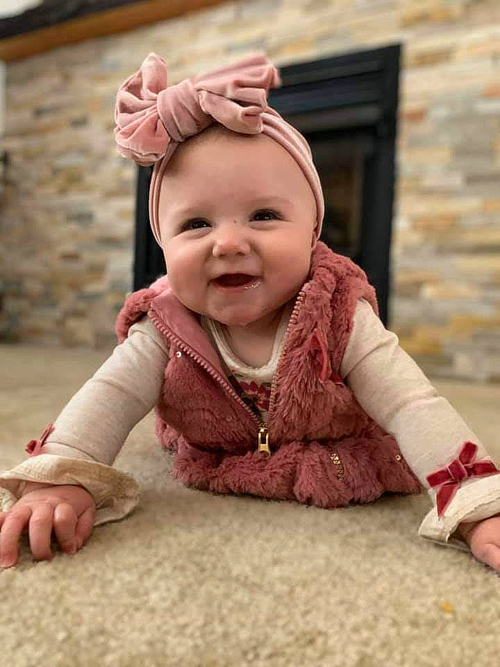 Anessa is registered to the contest to win money with this photo: baby, cheek, child, child_model, ear, headwear, joy, outerwear, person, pink, toddler