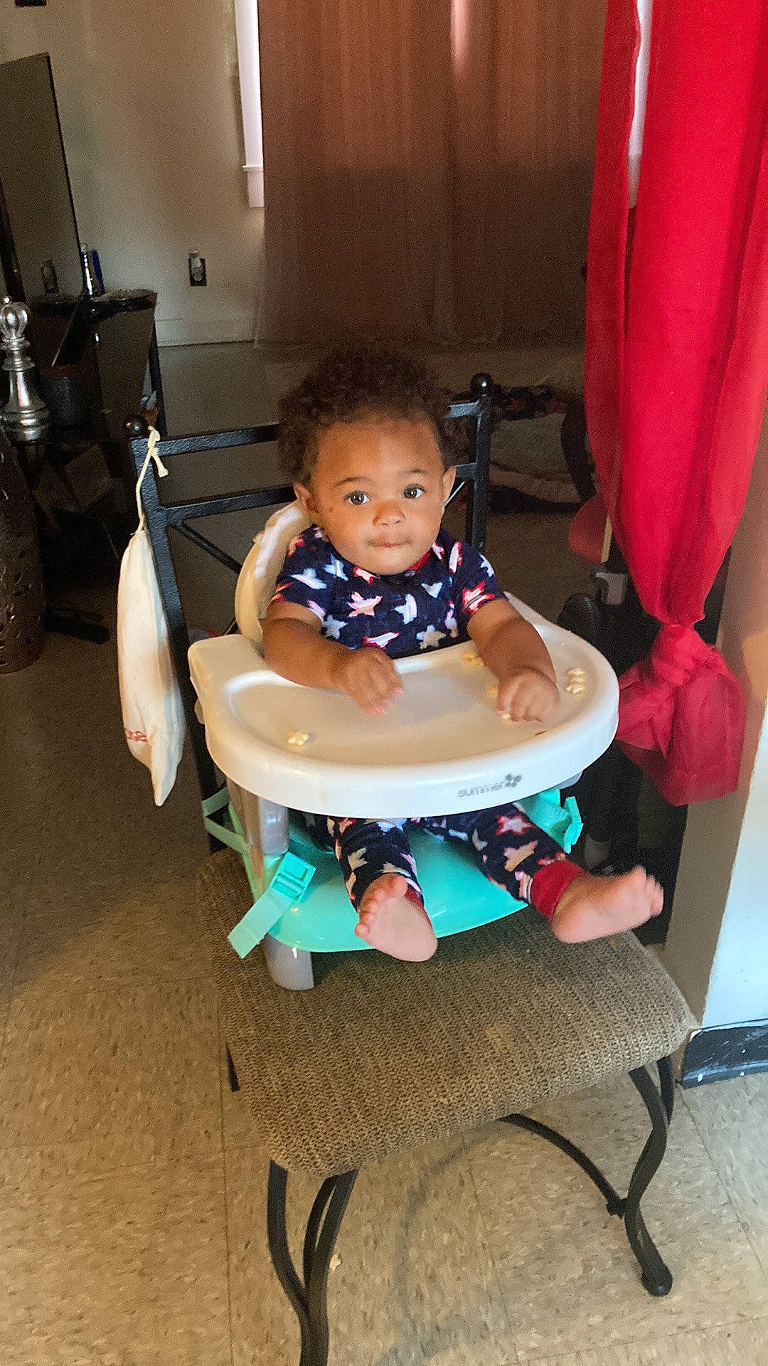 Amarion joined the competition — help win amazing prizes! baby, baby_carriage, baby_products, baby_toddler_clothing, chair, child, comfort, face, flooring, fun, human_leg, lap, leisure, outdoor_furniture, person, sitting, smile, table, thigh, tire