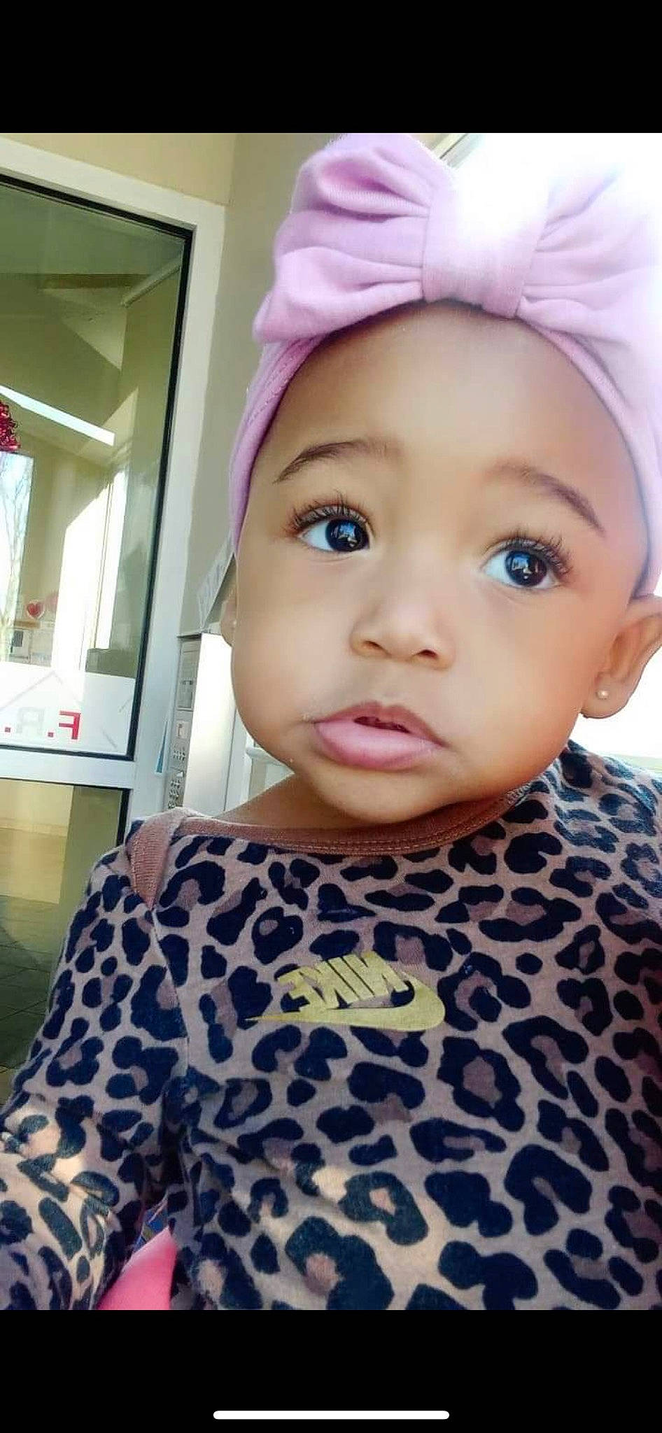 Kween is registered to the contest to win money with this photo: baby_toddler_clothing, cap, cheek, child, chin, cool, eyebrow, eyelash, forehead, headgear, lip, magenta, neck, nose, person, pink, skin, sleeve, t_shirt, toddler