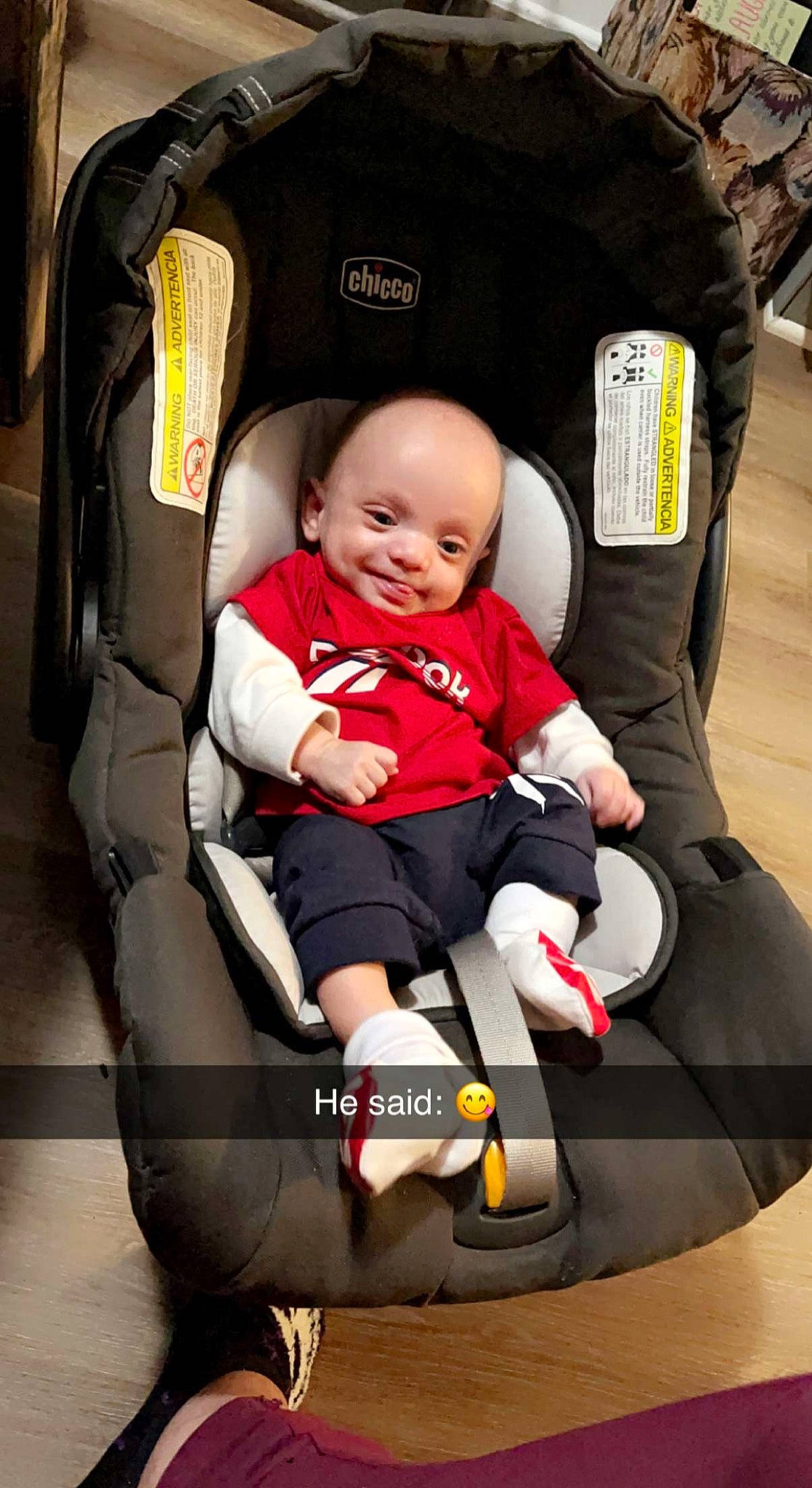 Nathaniel is registered to the contest to win money with this photo: auto_part, automotive_design, baby, baby_carriage, baby_products, baby_toddler_clothing, car_seat, car_seat_cover, child, comfort, fun, human_leg, joy, knee, lap, motor_vehicle, person, sitting, smile, thigh