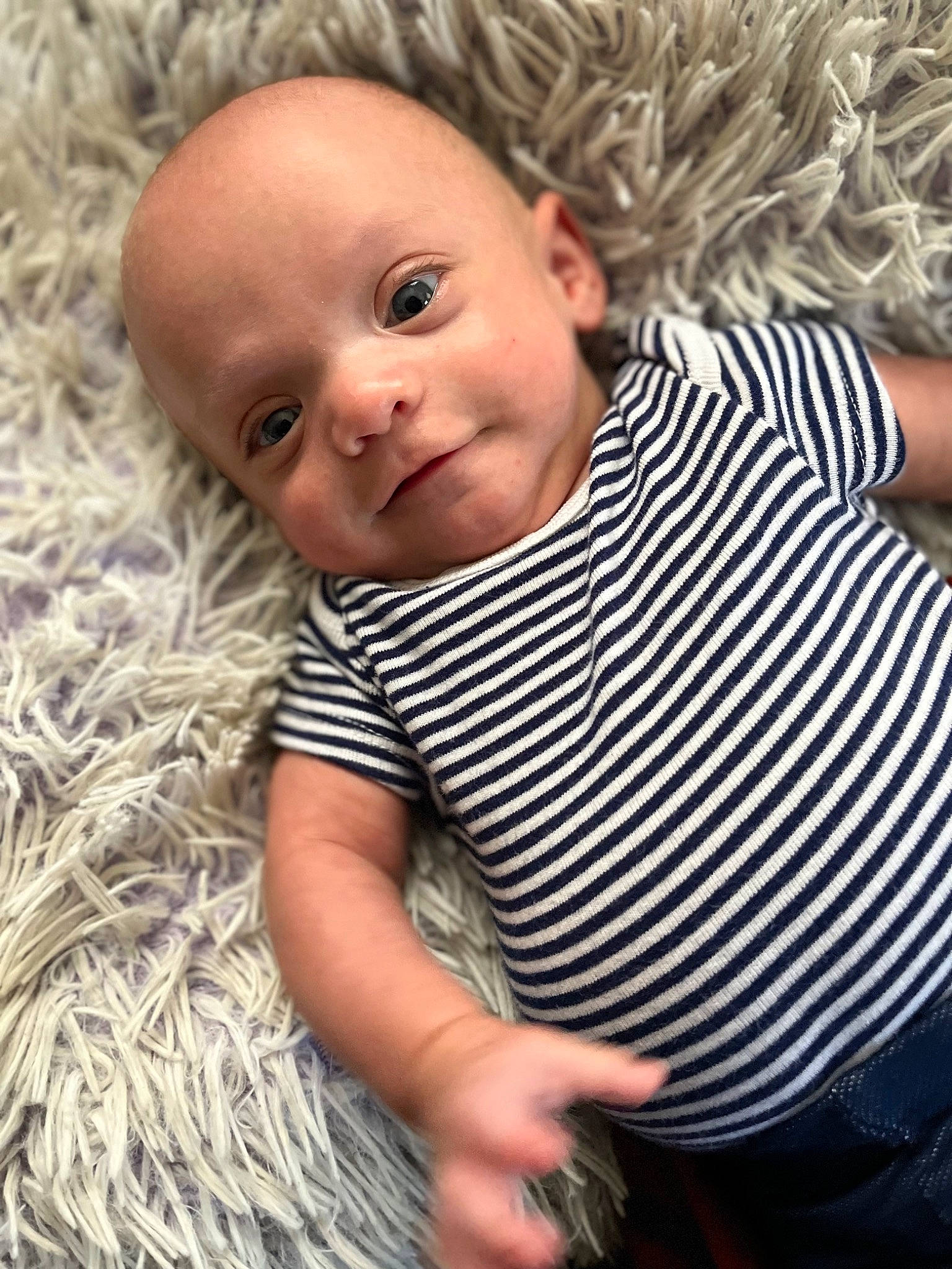Nathaniel is registered to the contest to win money with this photo: baby, baby_toddler_clothing, cheek, child, chin, comfort, grass, happy, human, iris, lip, nose, organ, pattern, person, sitting, skin, sleeve, smile, toddler