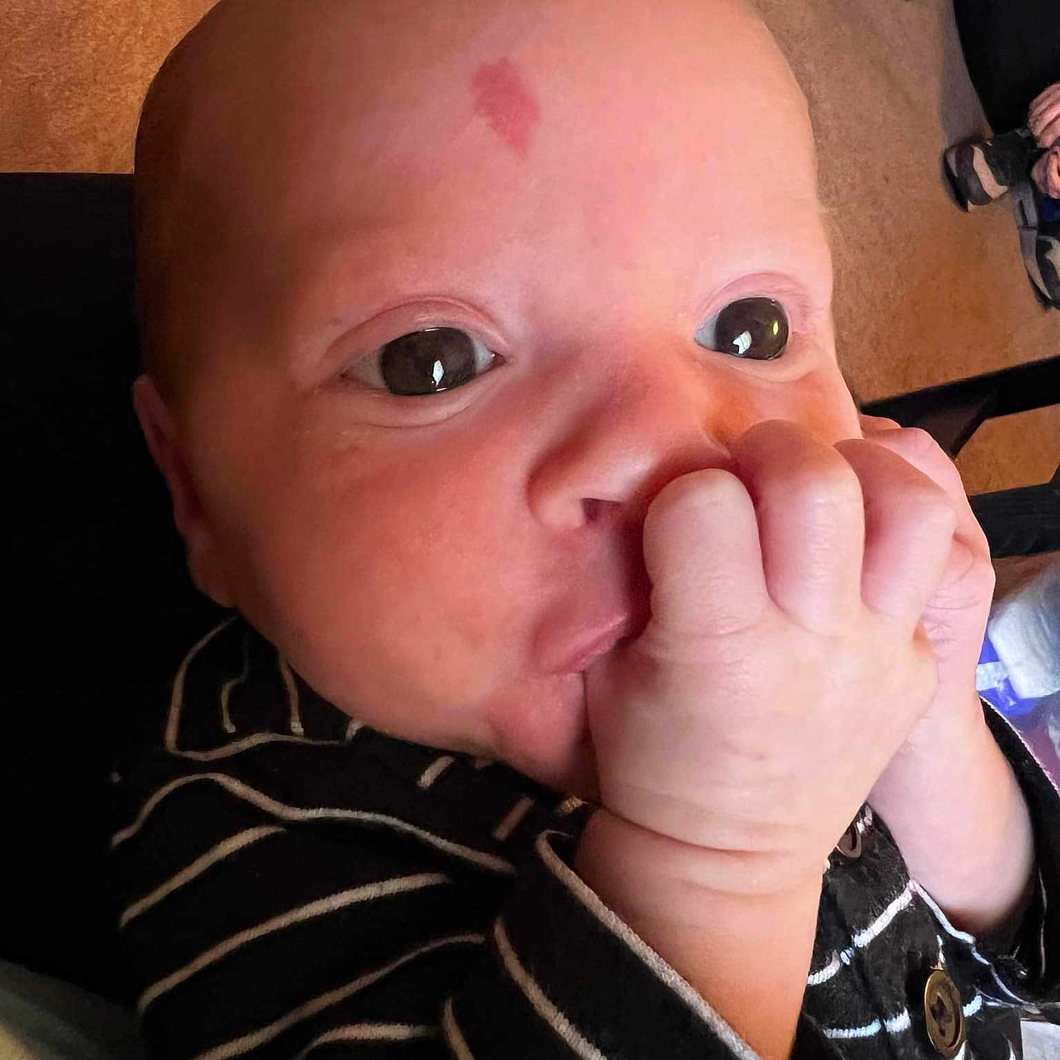 Phoenix is registered to the contest to win money with this photo: baby, baby_toddler_clothing, cheek, chin, ear, eye, eyebrow, eyelash, facial_expression, forehead, gesture, hairstyle, head, human_body, iris, lip, mouth, neck, nose, skin