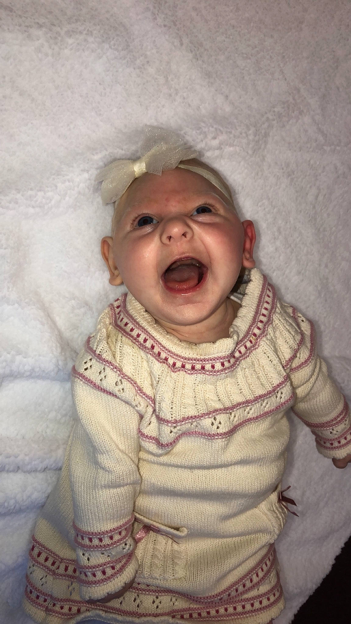 Kayla is registered to the contest to win money with this photo: baby, baby_laughing, cheek, child, chin, face, facial_expression, fun, head, headwear, laugh, mouth, nose, person, skin, smile, toddler