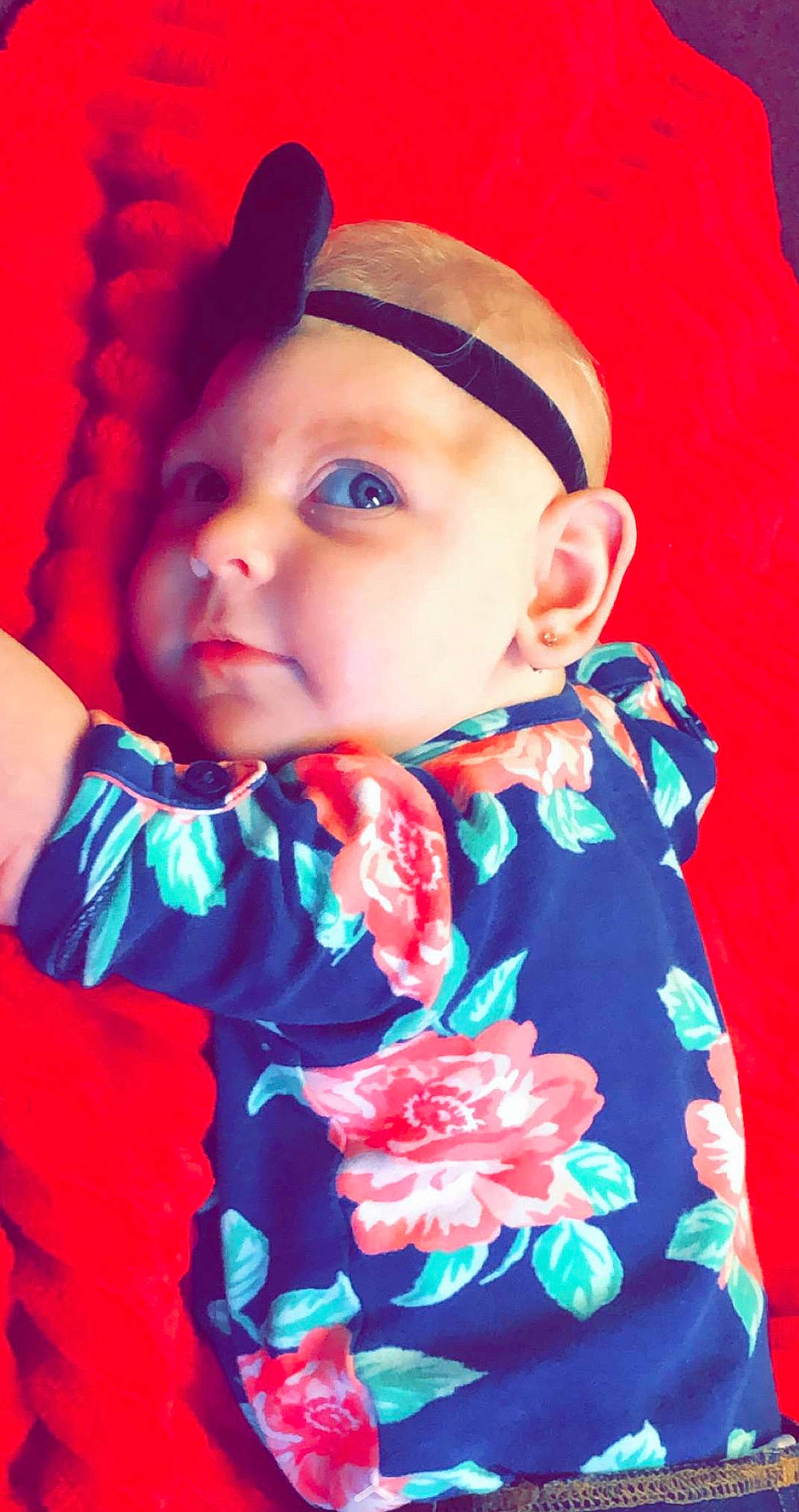 Kayla is registered to the contest to win money with this photo: baby, cheek, child, headwear, person, pink, red, smile, textile, toddler