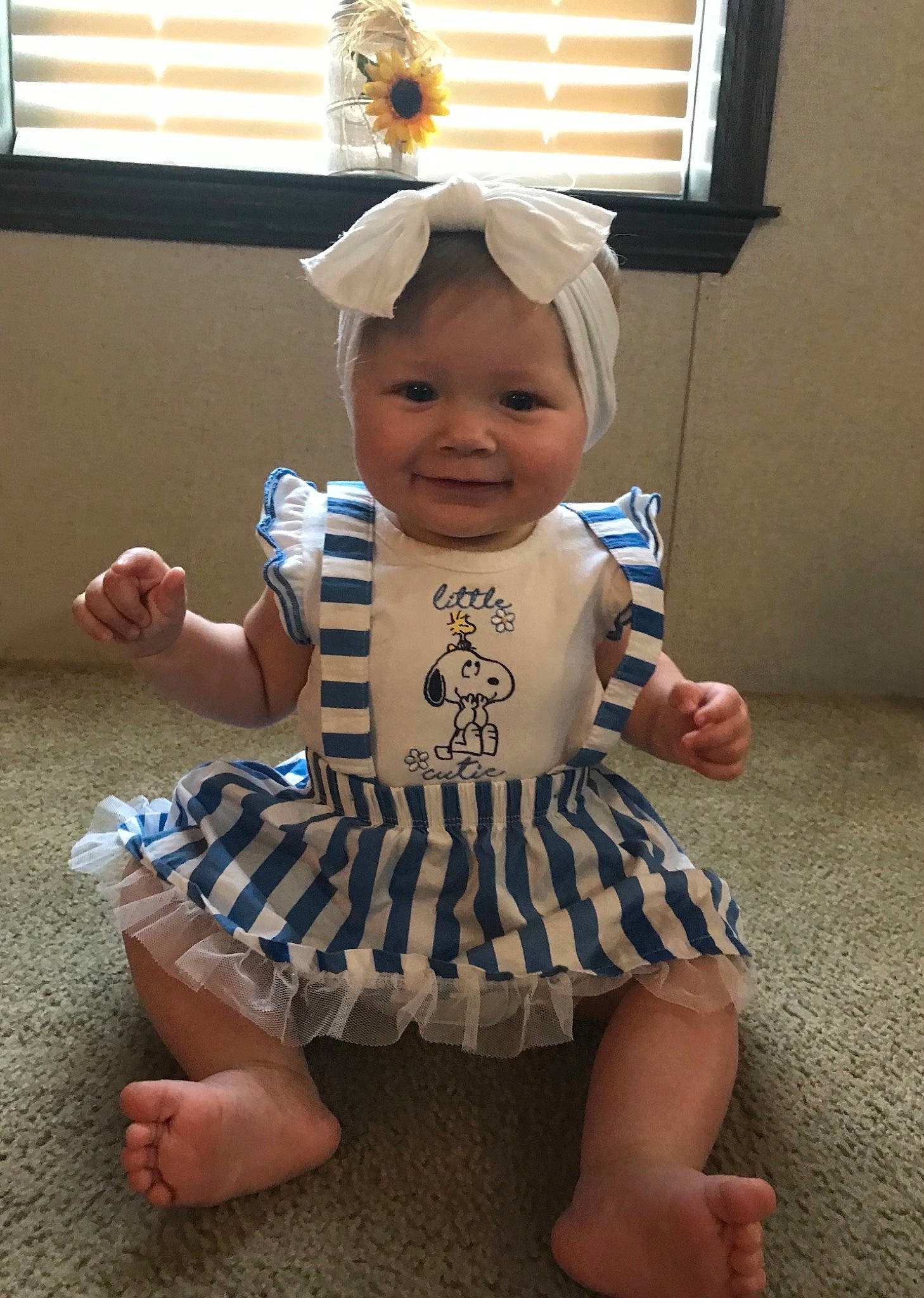 Carlee is registered to the contest to win money with this photo: baby, baby_toddler_clothing, child, costume, costume_hat, day_dress, event, fun, happy, hat, headgear, headwear, human_leg, joy, one_piece_garment, pattern, person, sleeve, smile, thumb