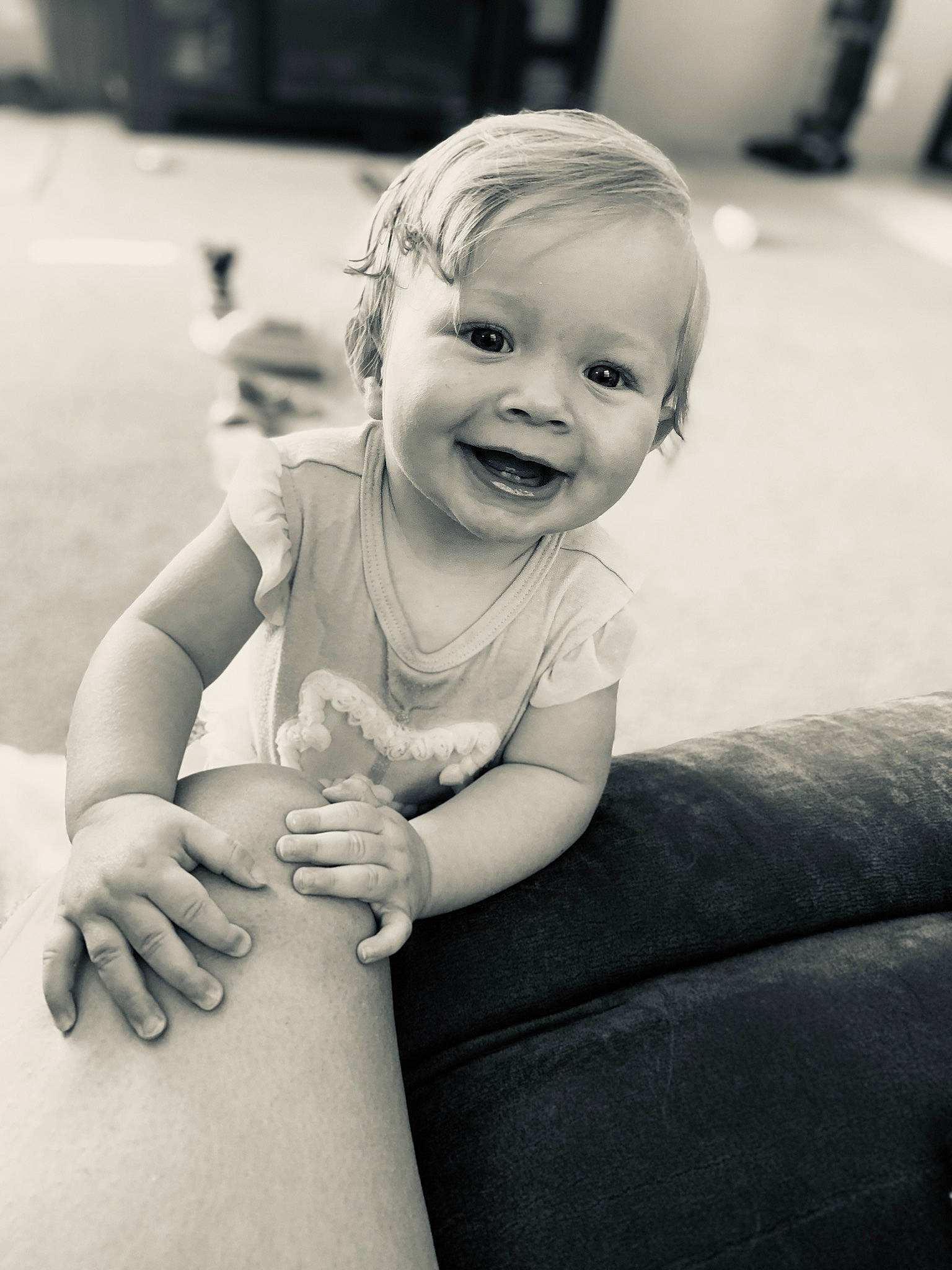 Carlee joined the competition — help win amazing prizes! arm, baby, black, black_and_white, finger, flash_photography, gesture, hairstyle, happy, head, iris, joint, joy, mammal, monochrome, person, shoulder, skin, smile, style