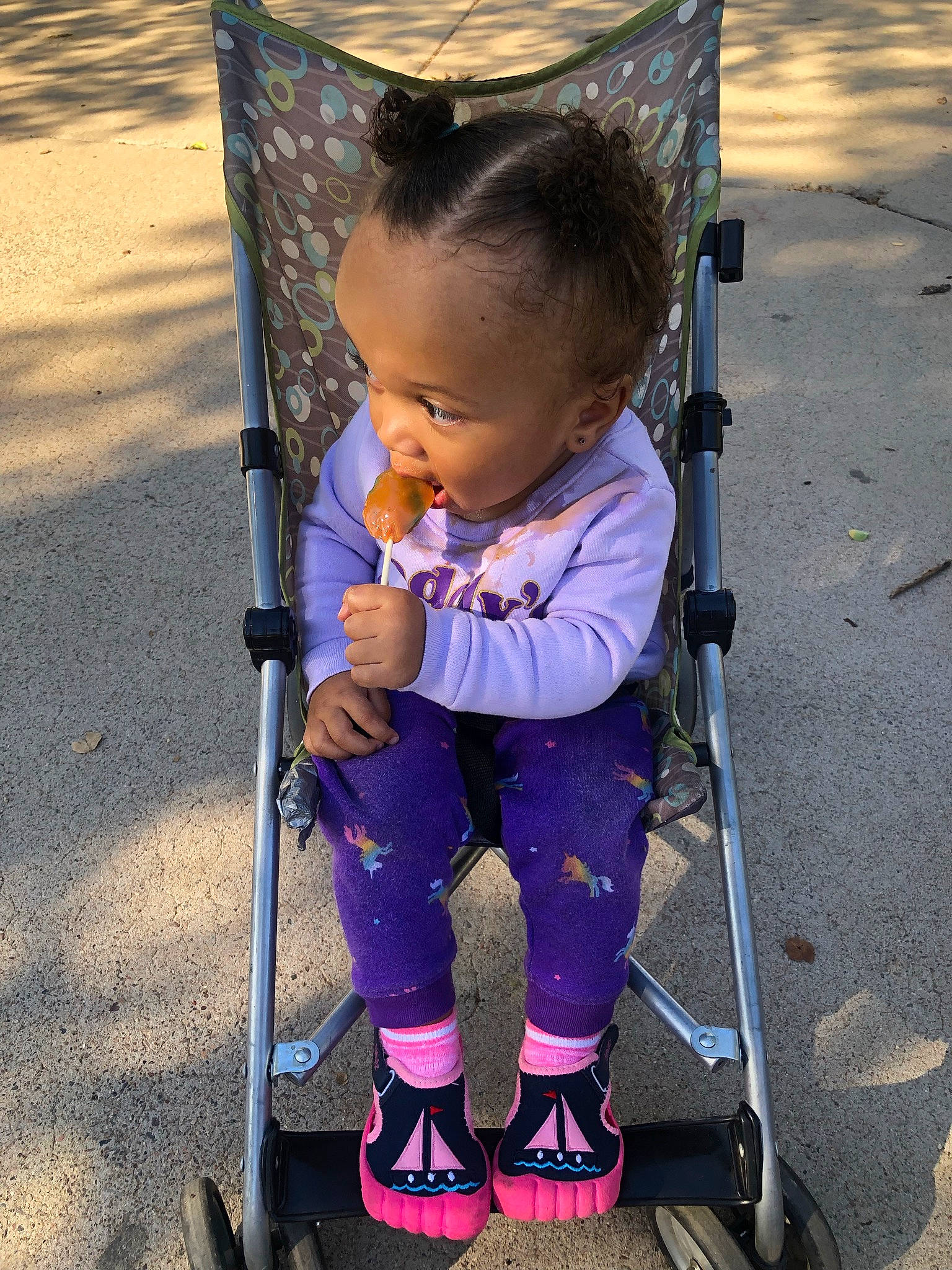 Isis Blue joined the competition — help win amazing prizes! baby, baby_carriage, baby_products, electric_blue, fun, grass, leg, line, people_in_nature, person, photograph, product, public_space, recreation, snapshot, sneakers, tints_and_shades, tire, toddler, wheel